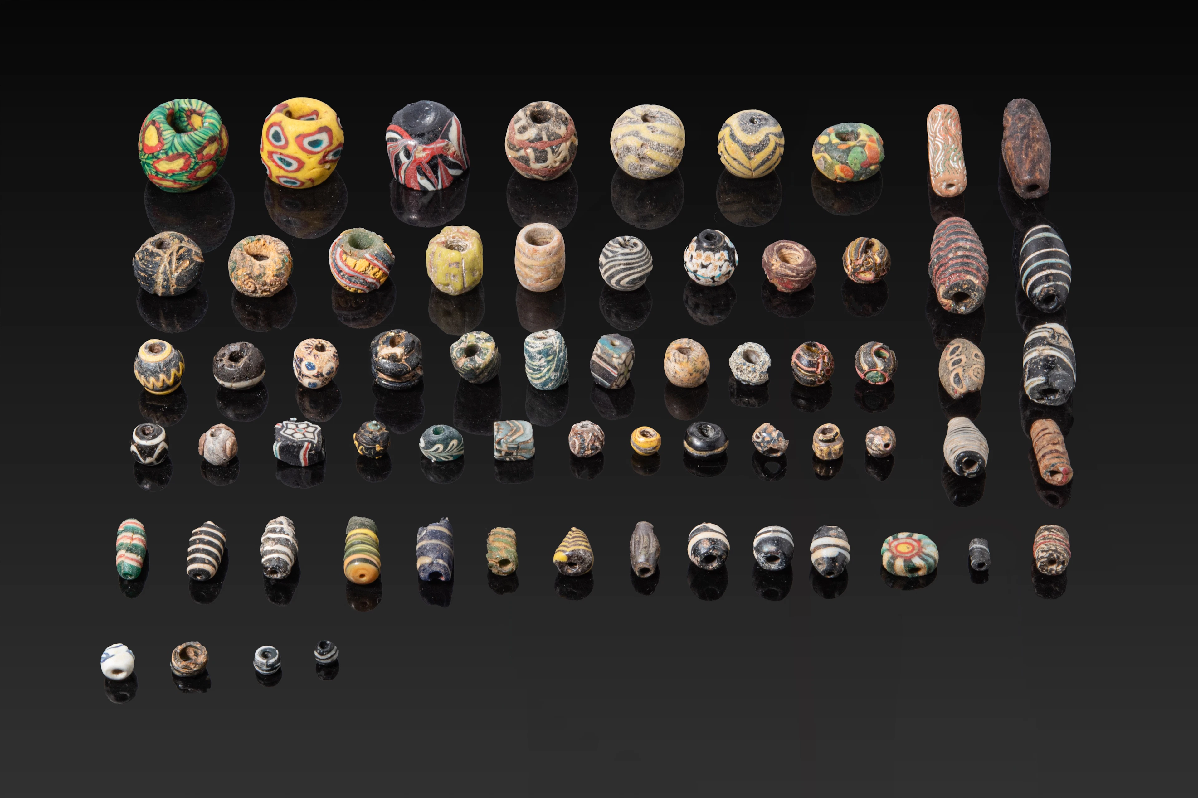 LARGE COLLECTION OF GREEK AND ROMAN POLYCHROME GLASS BEADS