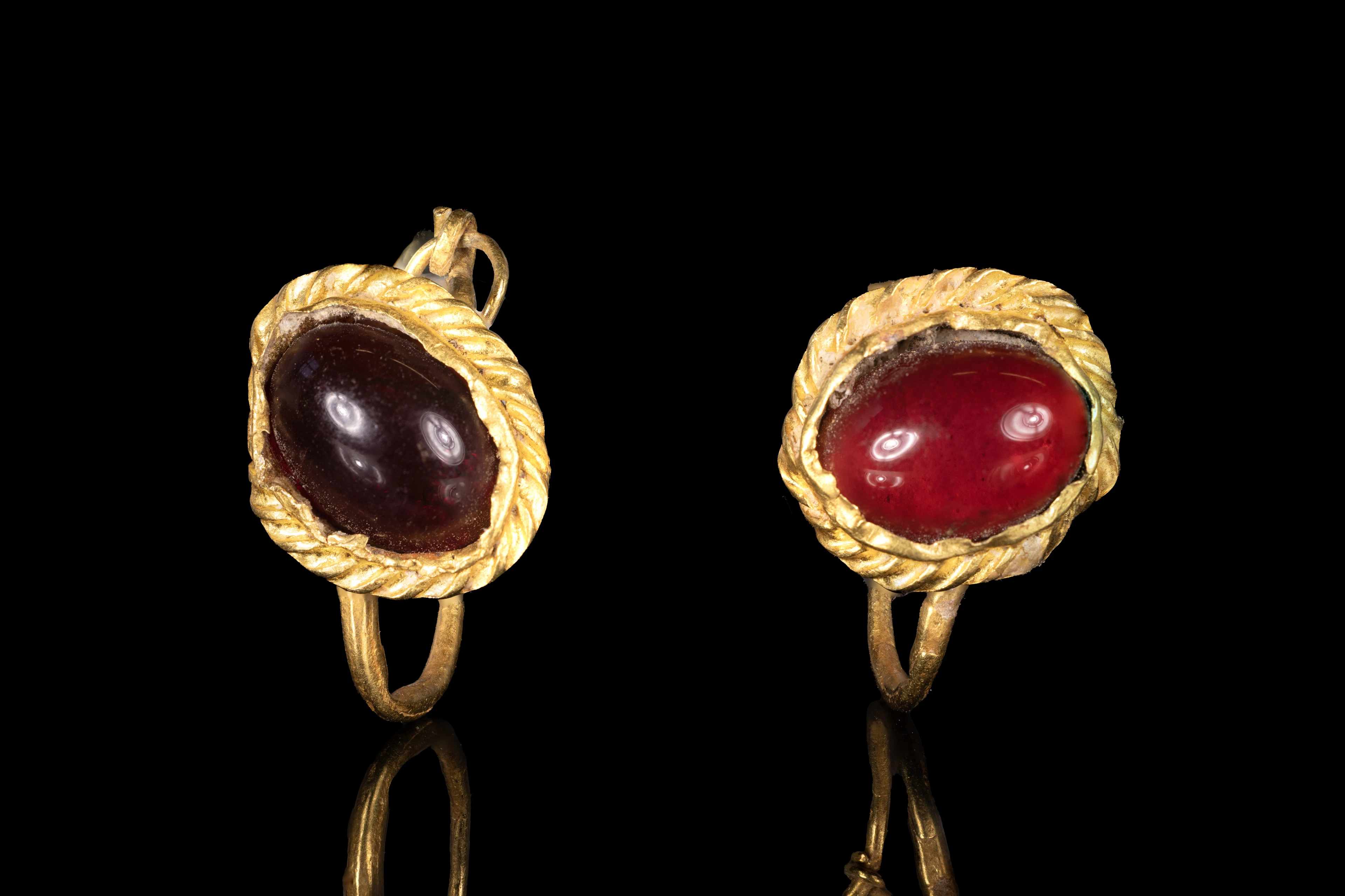 MATCHED PAIR OF HELLENISTIC GOLD EARRINGS WITH CARNELIAN CABOCHONS
