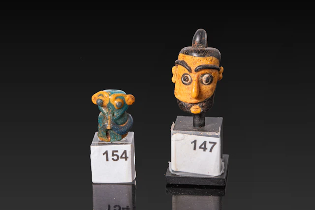 PAIR OF STUNNING PHOENICIAN POLYCHROME GLASS FIGURAL BEADS