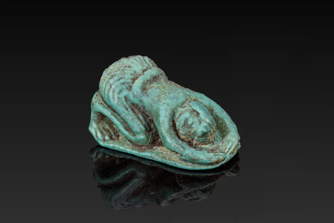 EGYPTIAN FAIENCE SUPPLICANT AMULET