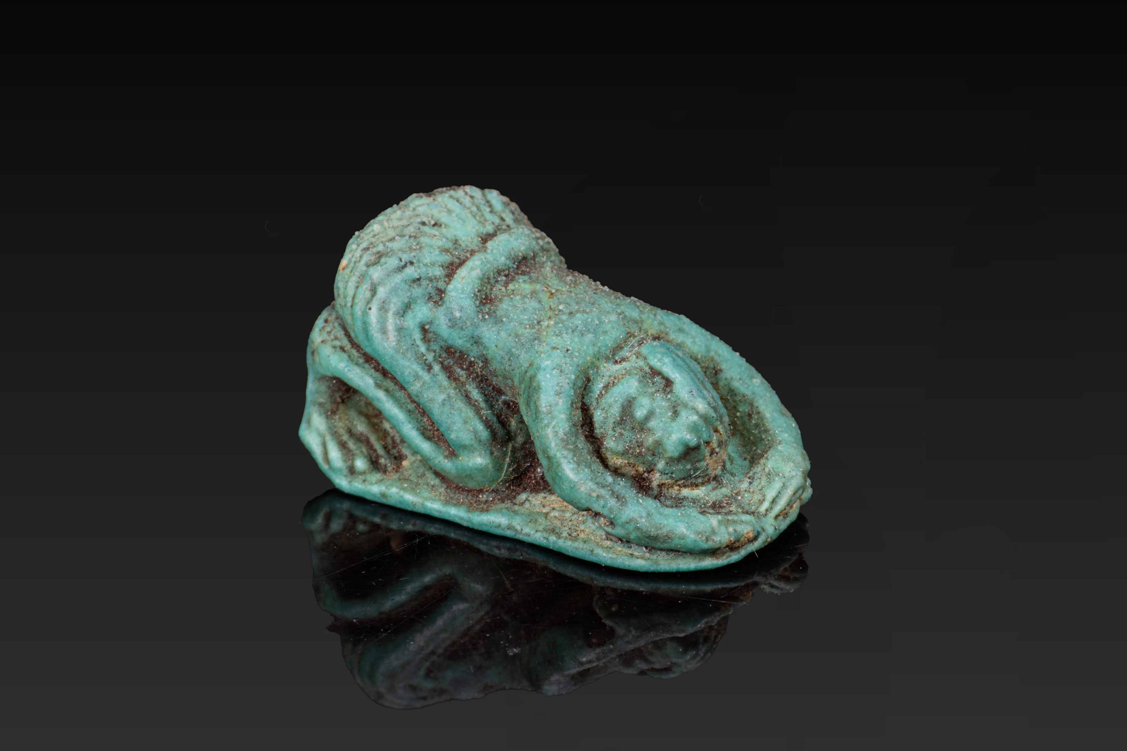 EGYPTIAN FAIENCE SUPPLICANT AMULET