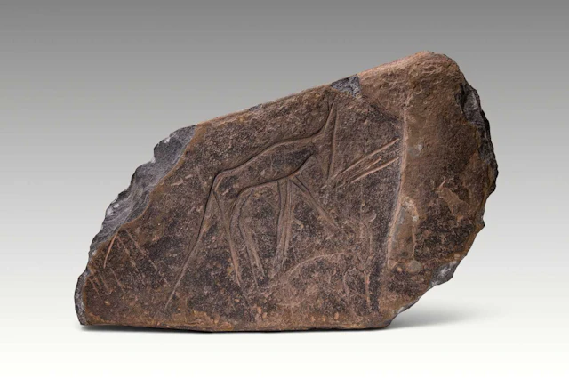EGYPTIAN PREDYNASTIC ENGRAVED STONE WITH ANIMALS