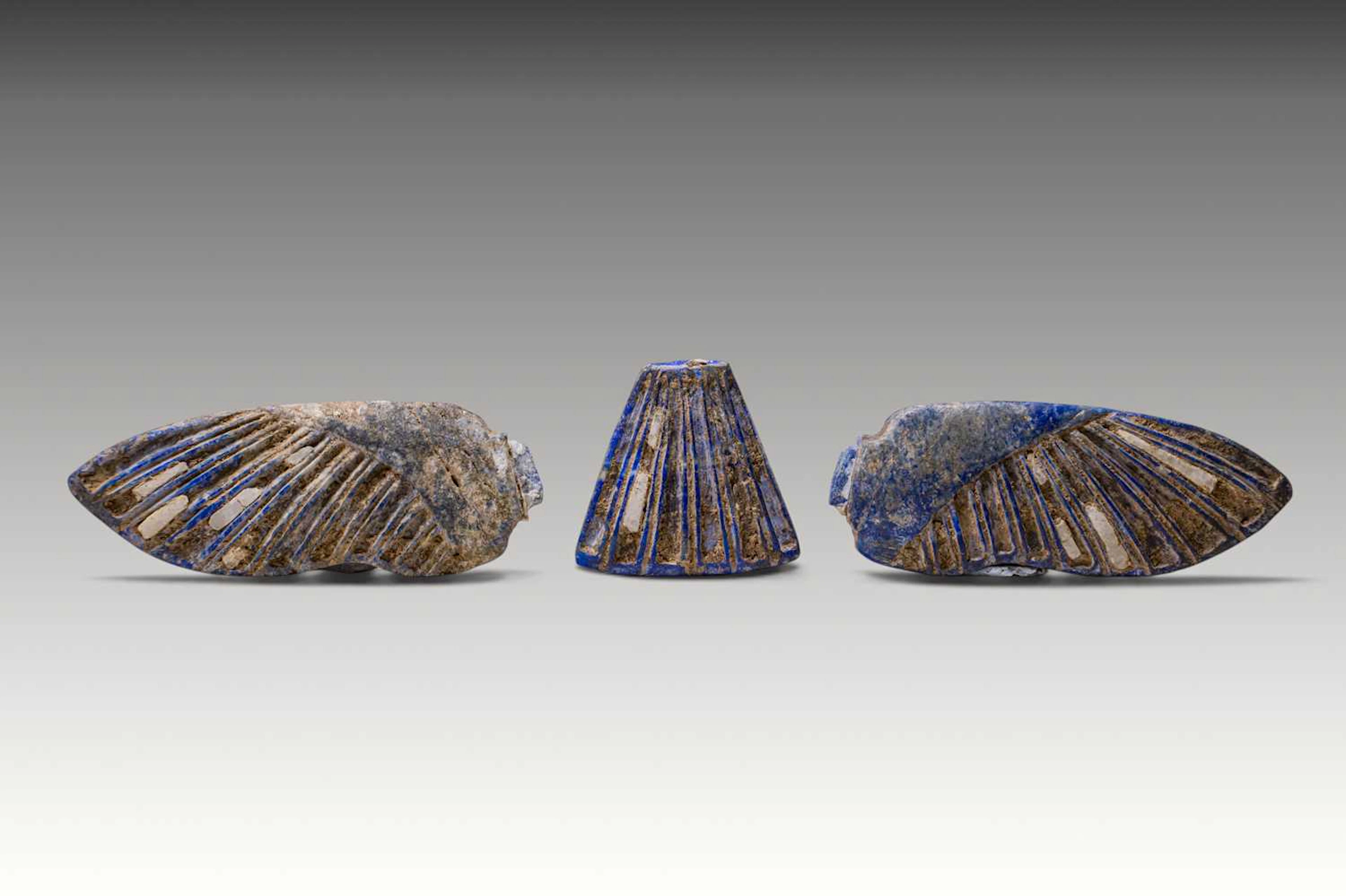 EGYPTIAN LAPIS LAZULI INLAYS FROM A FALCON FIGURE
