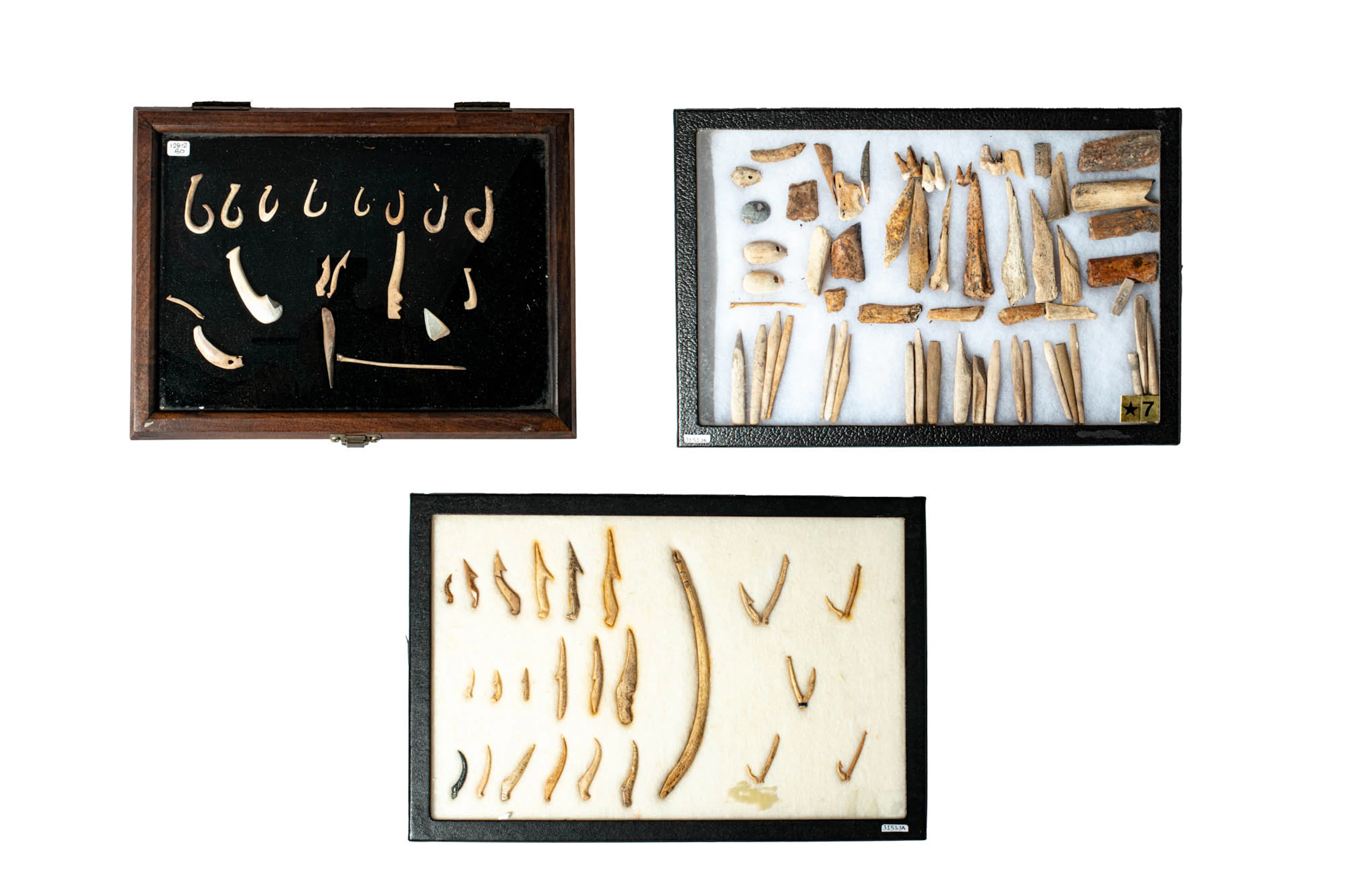 TWO SETS OF HAWAIIAN FISH HOOKS AND ONE SET OF OCEANIC FISHING IMPLEMENTS