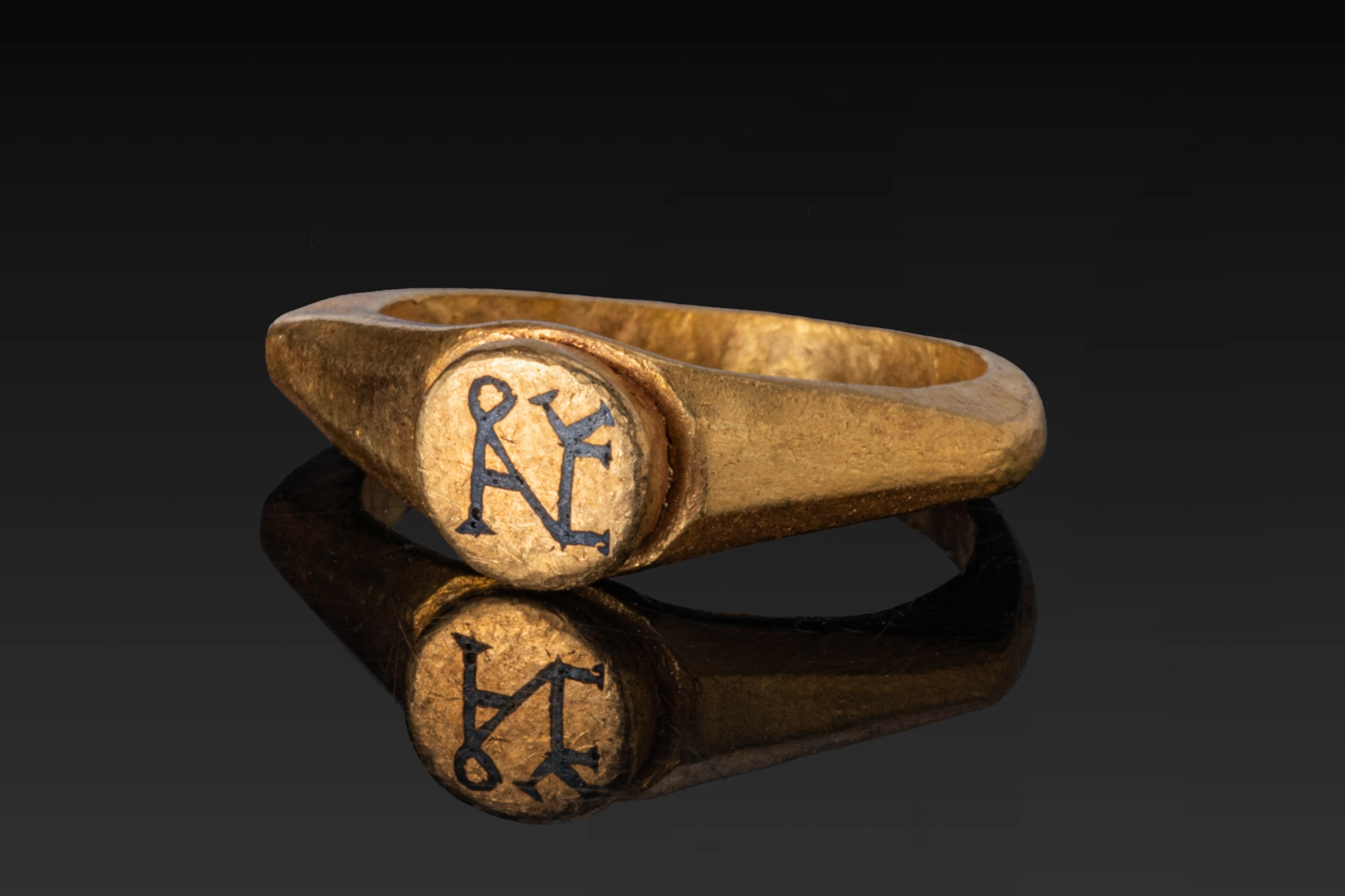 BYZANTINE HIGH KARAT GOLD AND NIELLO RING WITH MONOGRAM