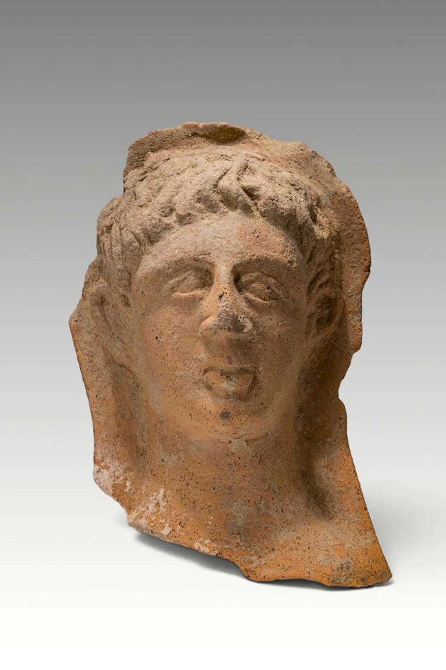 ROMANO-ETRUSCAN TERRACOTTA HEAD OF A YOUTH