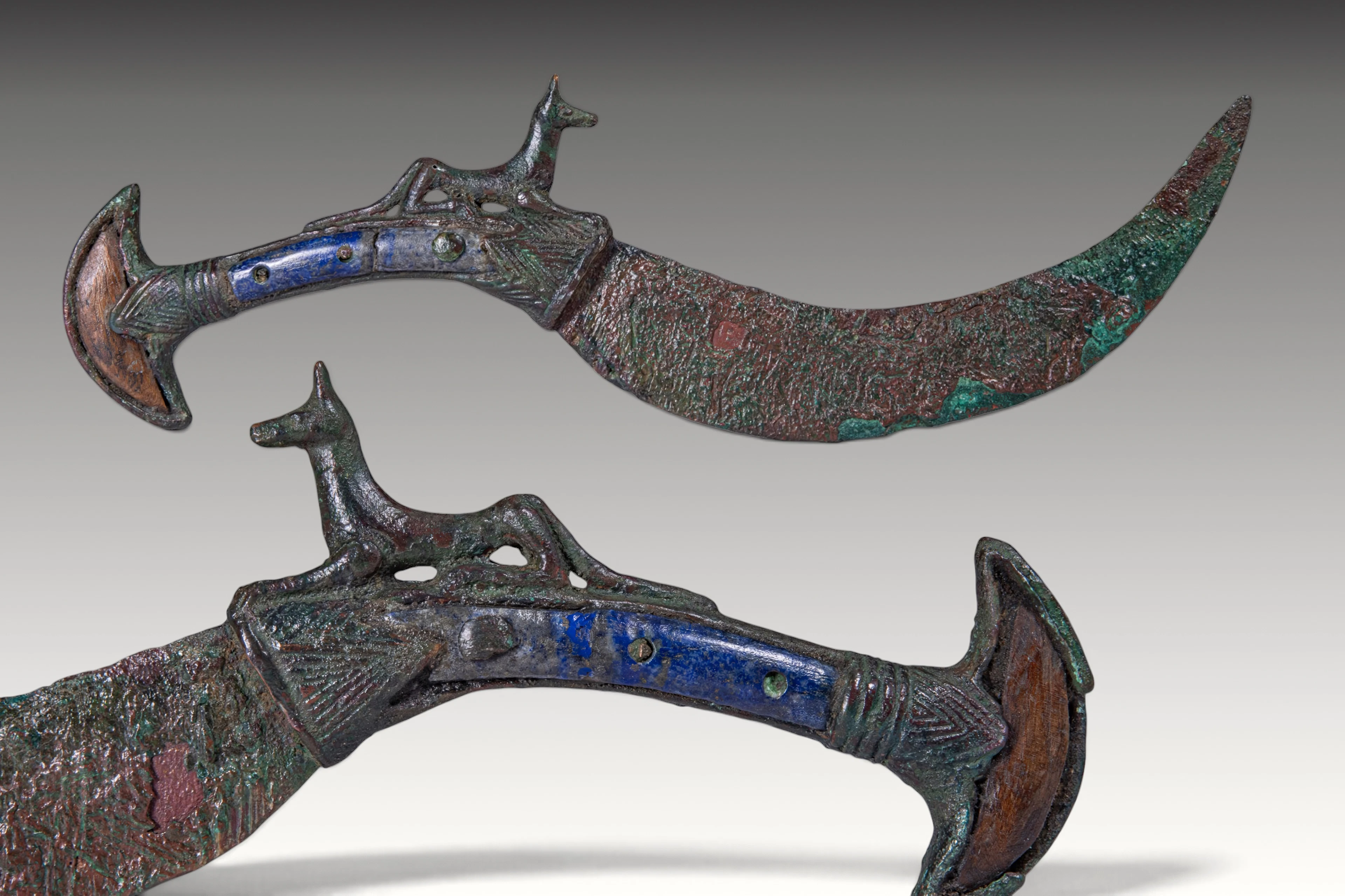 EXTREMELY RARE EGYPTIAN INLAID BRONZE KNIFE WITH ANUBIS AND PAPYRUS-FORM HANDLE