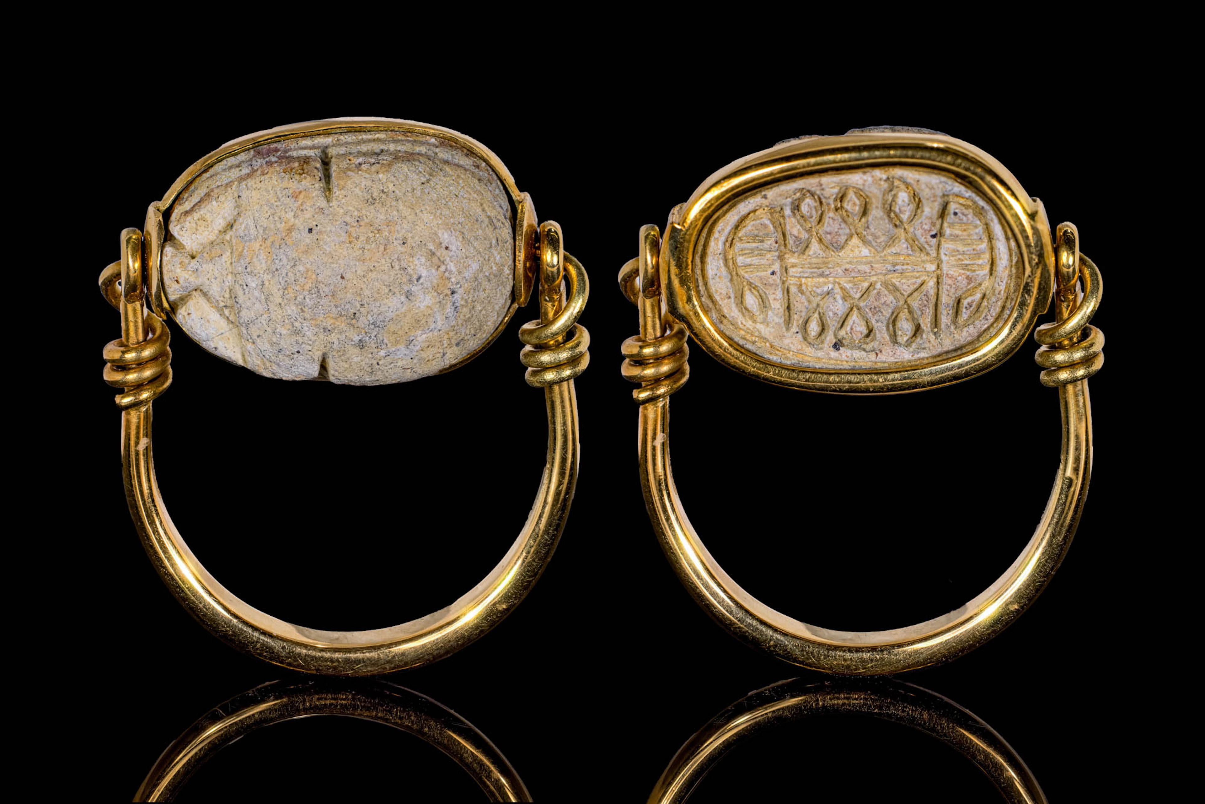 EGYPTIAN STONE SCARAB WITH SYMBOLS IN SWIVEL GOLD RING