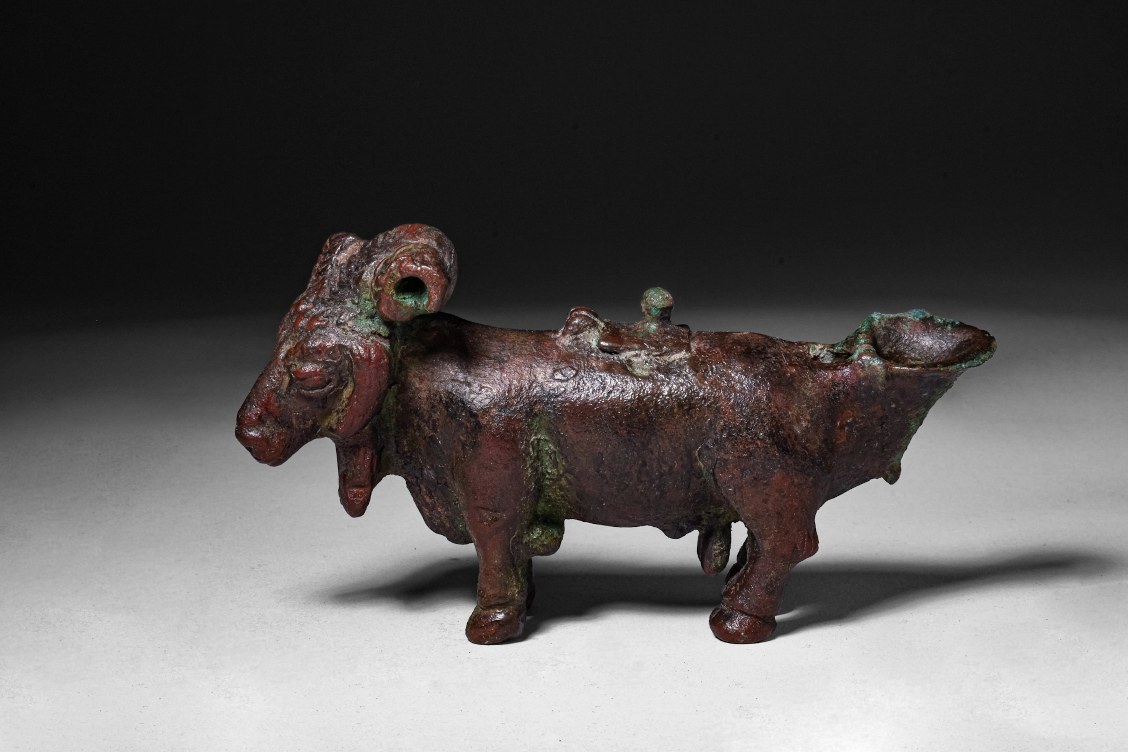ROMANO-EGYPTIAN BRONZE RAM-SHAPED OIL LAMP