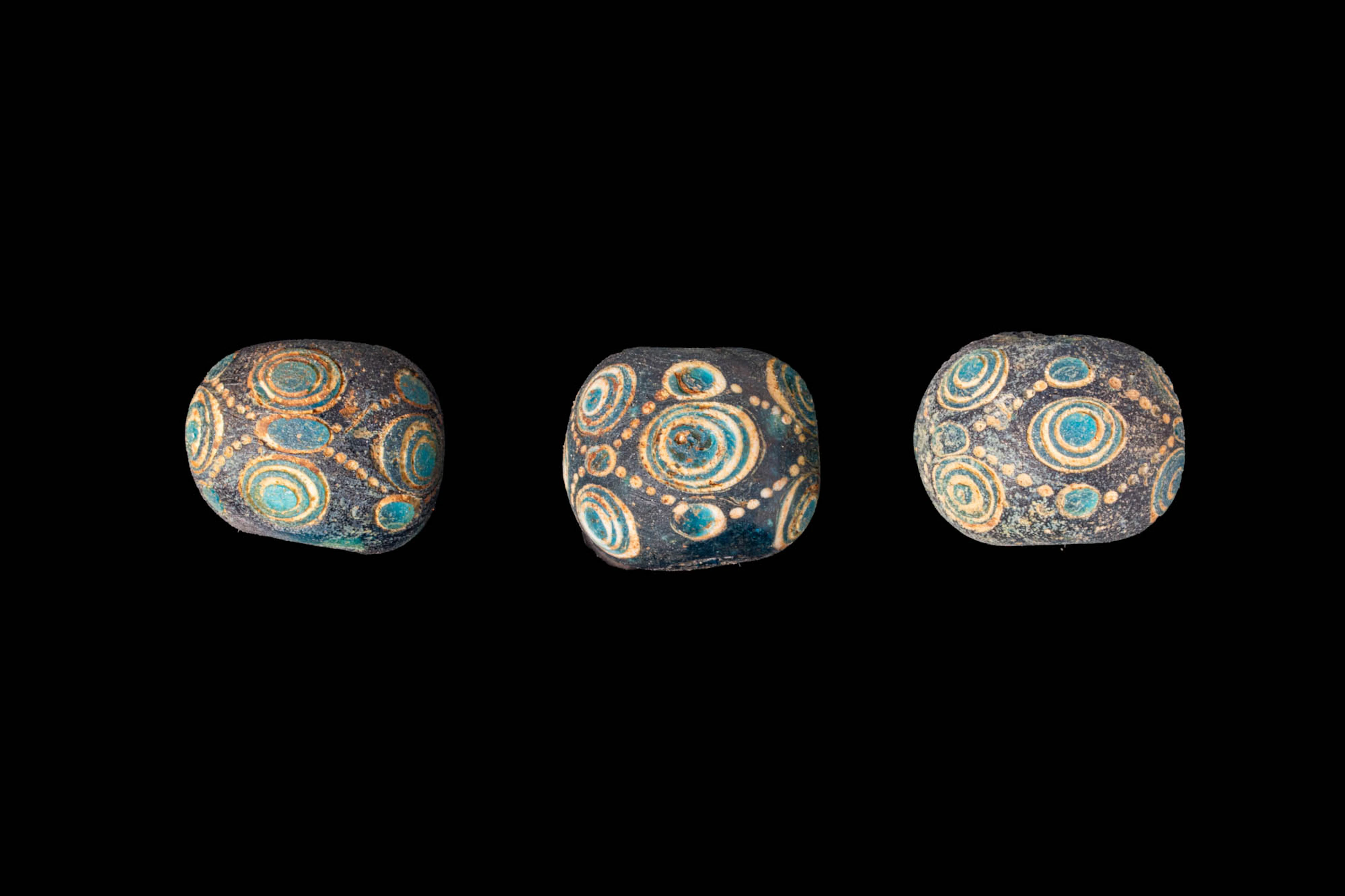 COLLECTION OF LARGE CHINESE POLYCHROME GLASS EYE BEADS