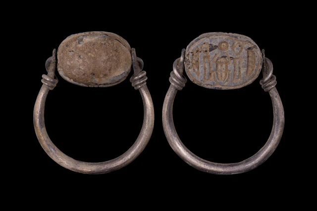 EGYPTIAN FAIENCE SCARAB WITH KHEPRI, PAPYRUS STEMS AND A SOLAR DISC