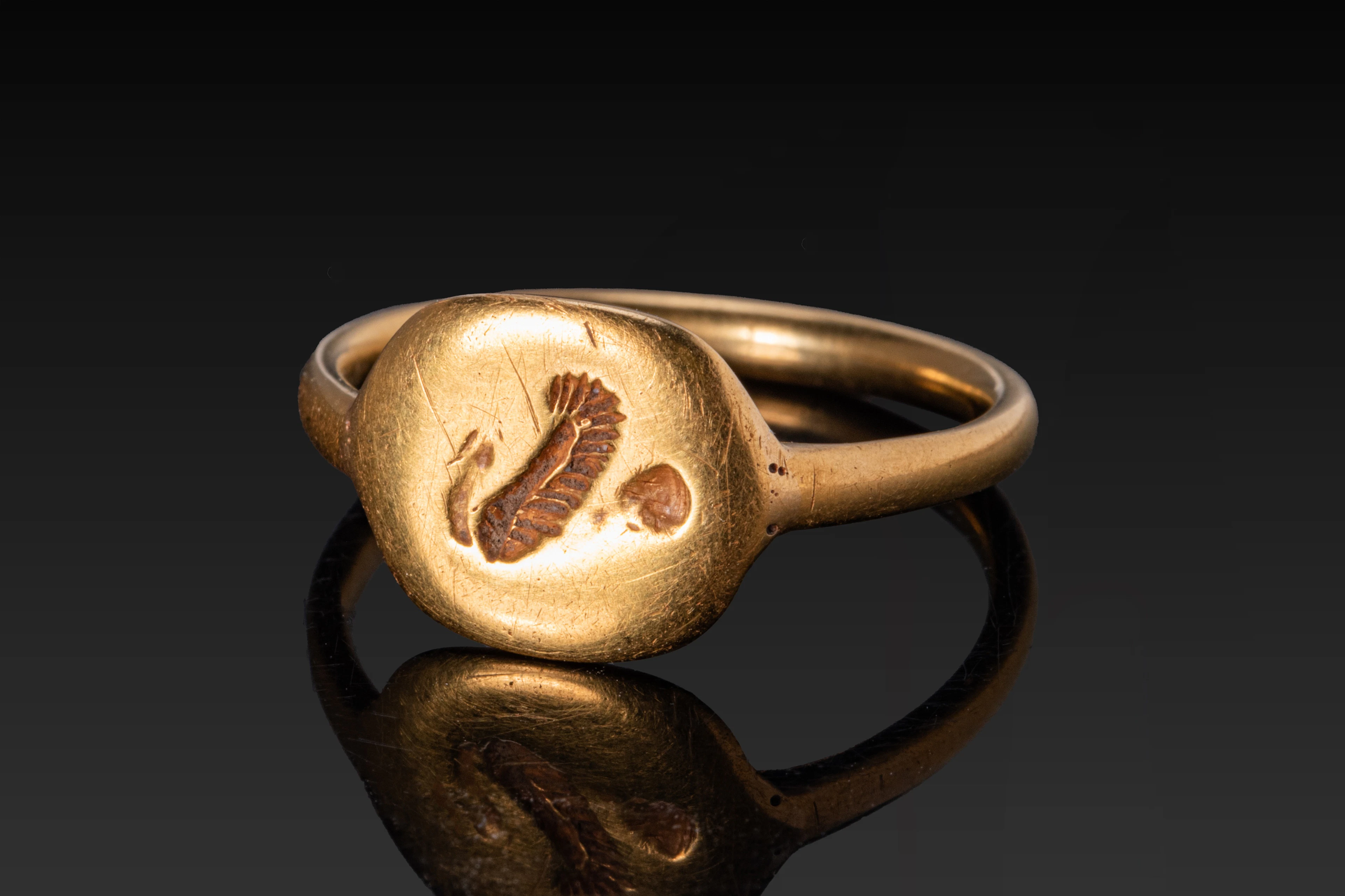 CELTIC GOLD SIGNET RING WITH ENGRAVED BIRD