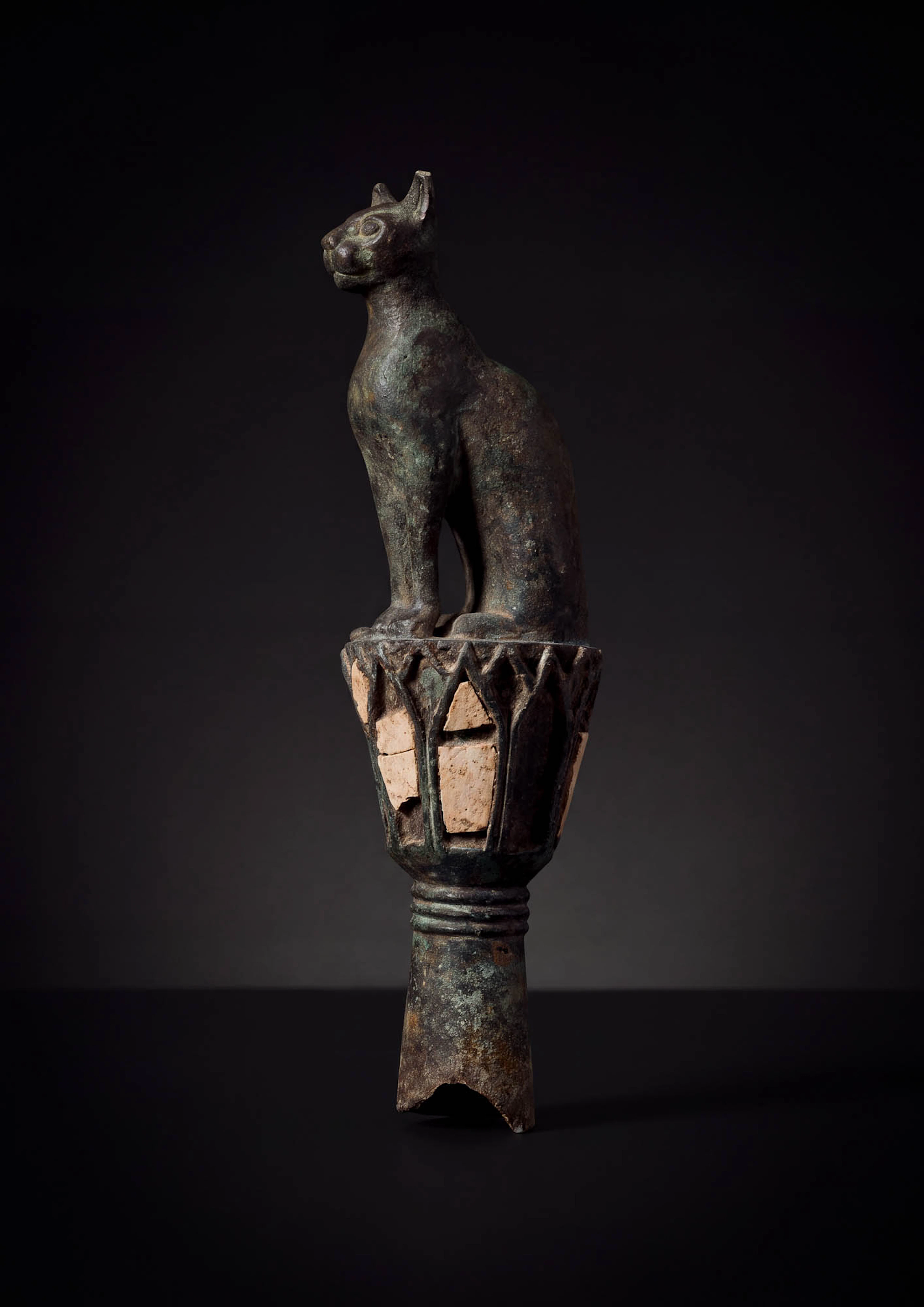 EGYPTIAN BRONZE GODDESS BASTET AS A CAT ON A LOTUS COLUMN