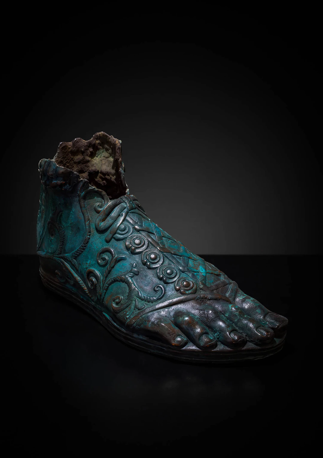 ROMAN IMPERIAL BRONZE FOOT FROM A MONUMENTAL STATUE