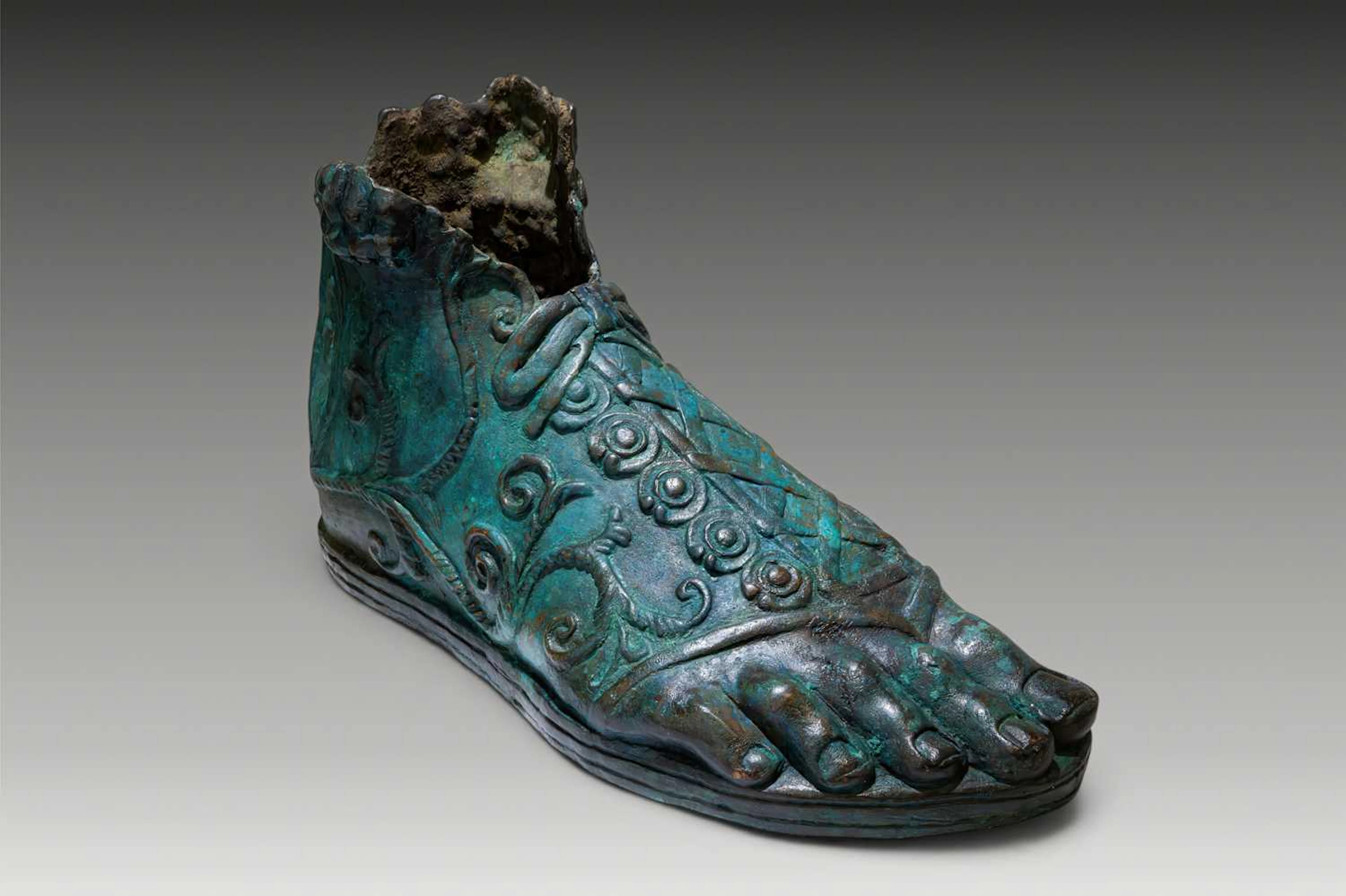 ROMAN IMPERIAL BRONZE FOOT FROM A MONUMENTAL STATUE