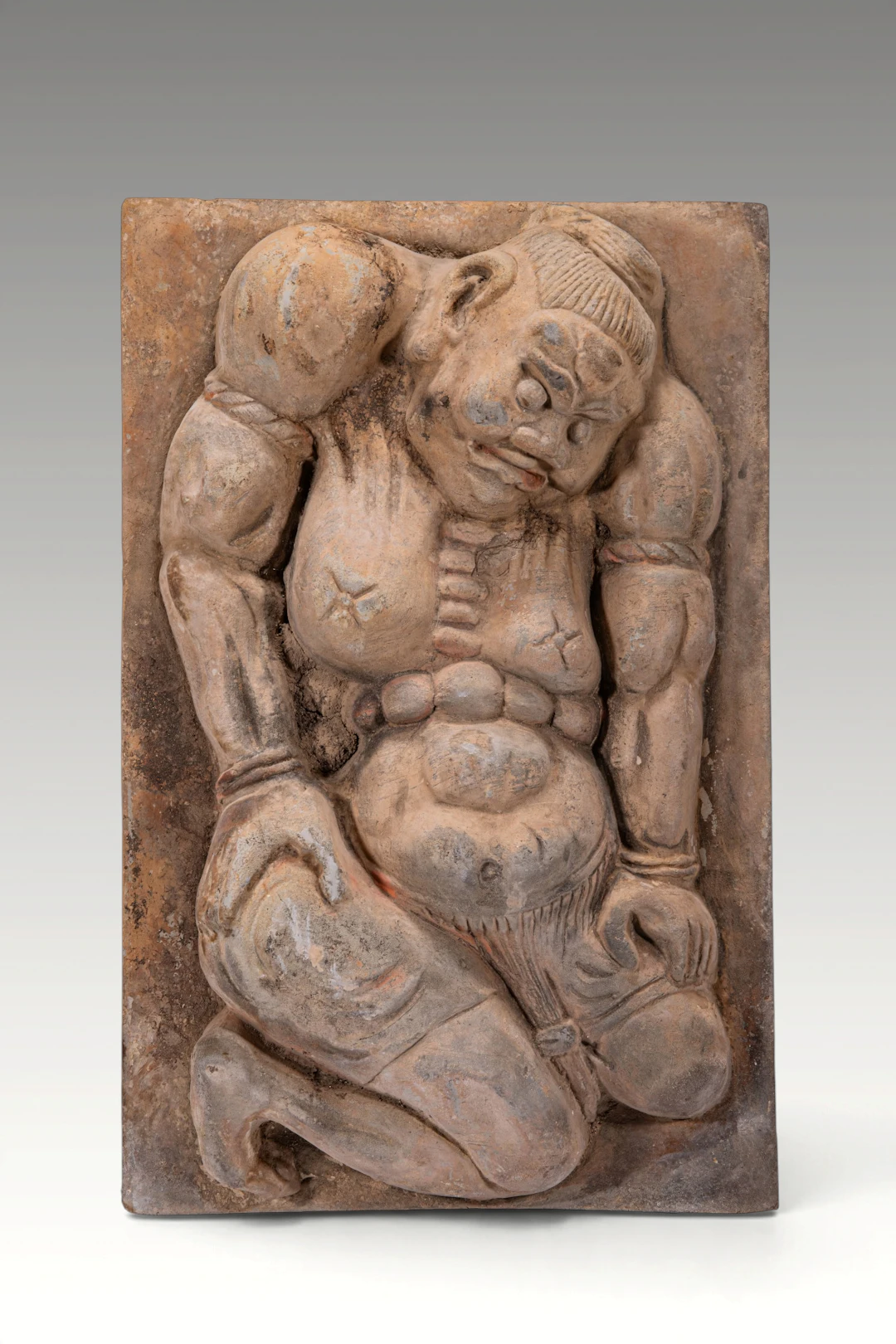 CHINESE TERRACOTTA PANEL DEPICTING A WARRIOR
