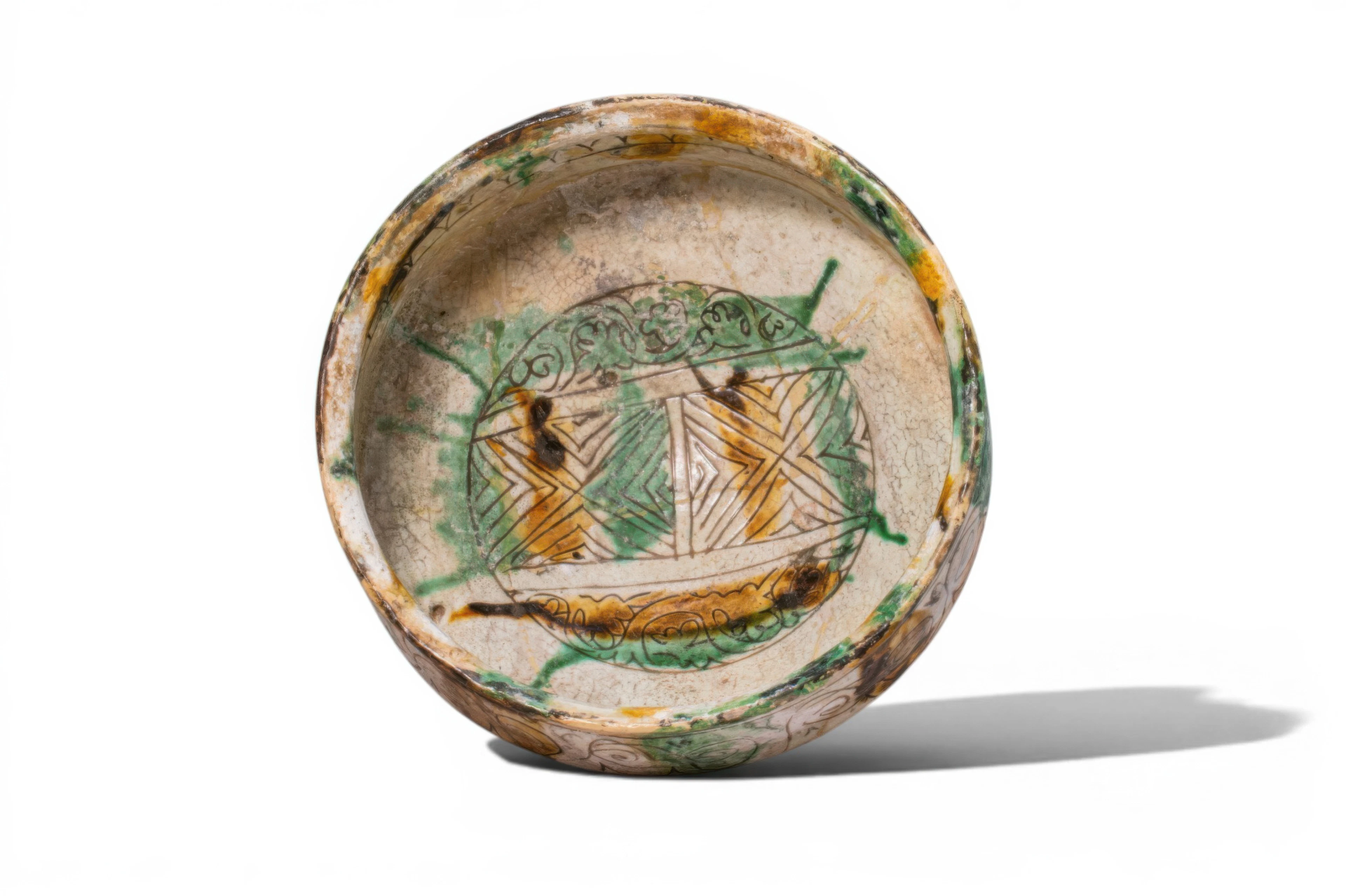 BYZANTINE GLAZED TERRACOTTA FOOTED BOWL WITH GEOMETRIC MOTIFS - EX