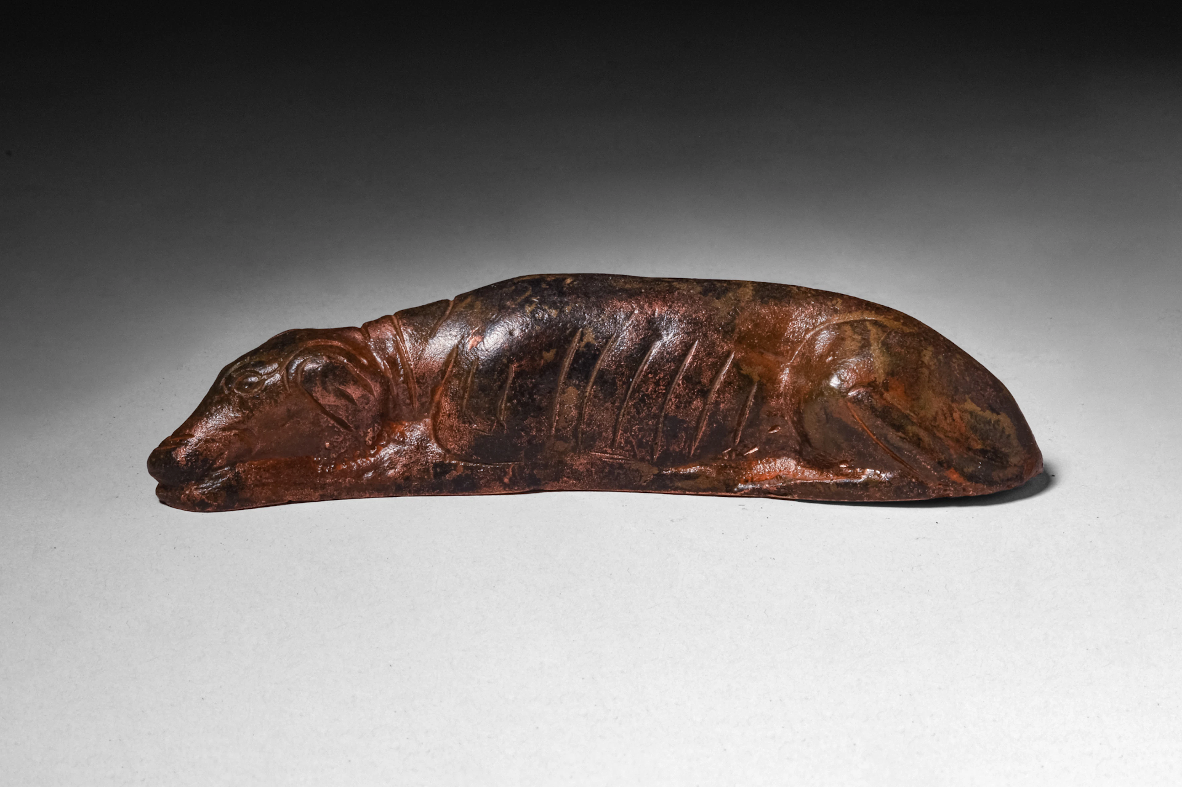 ROMAN BRONZE FIGURINE OF A SLEEPING DOG