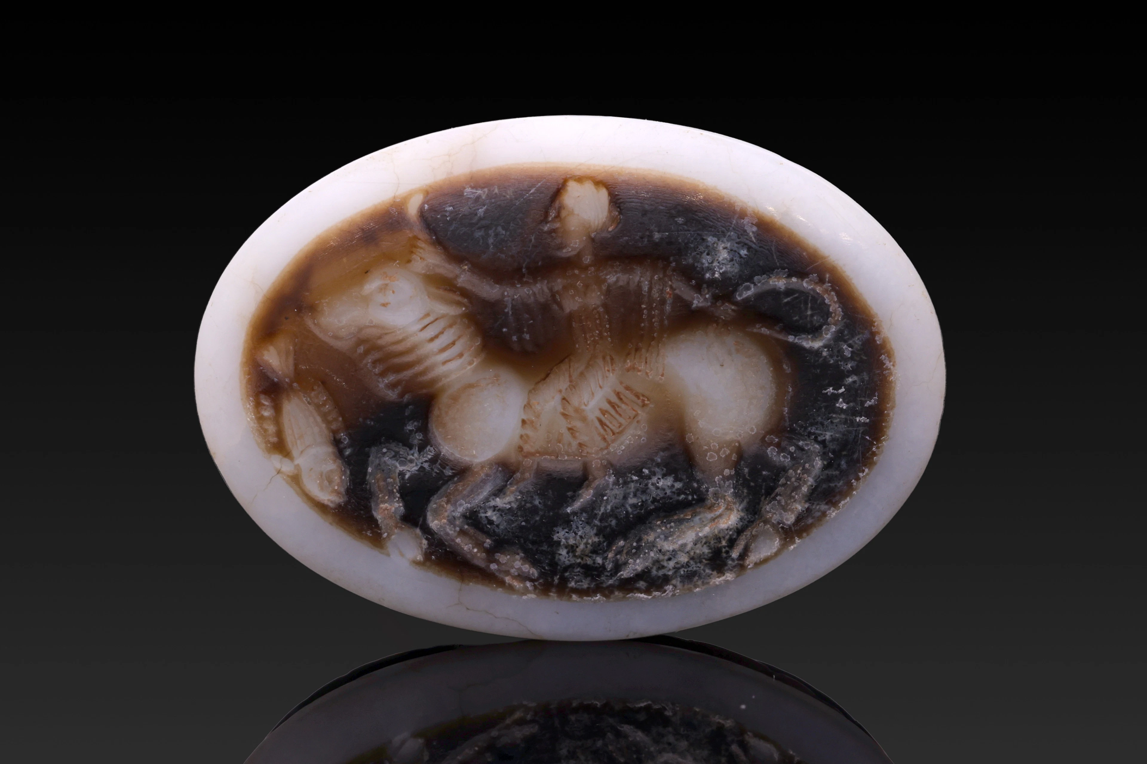 EASTERN GREEK AGATE SCARAB WITH RIDER ON THE BULL AND FISH
