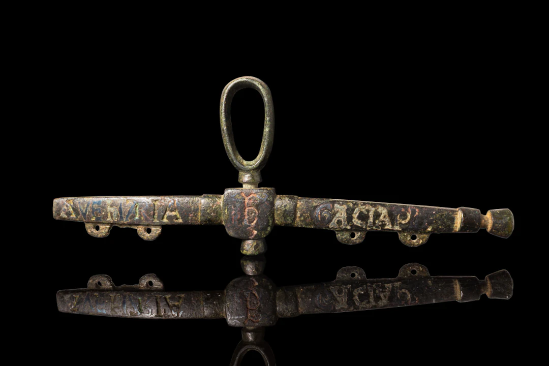 MEDIEVAL BRONZE PURSE BAR INSCRIBED WITH 'AVE MARIA'