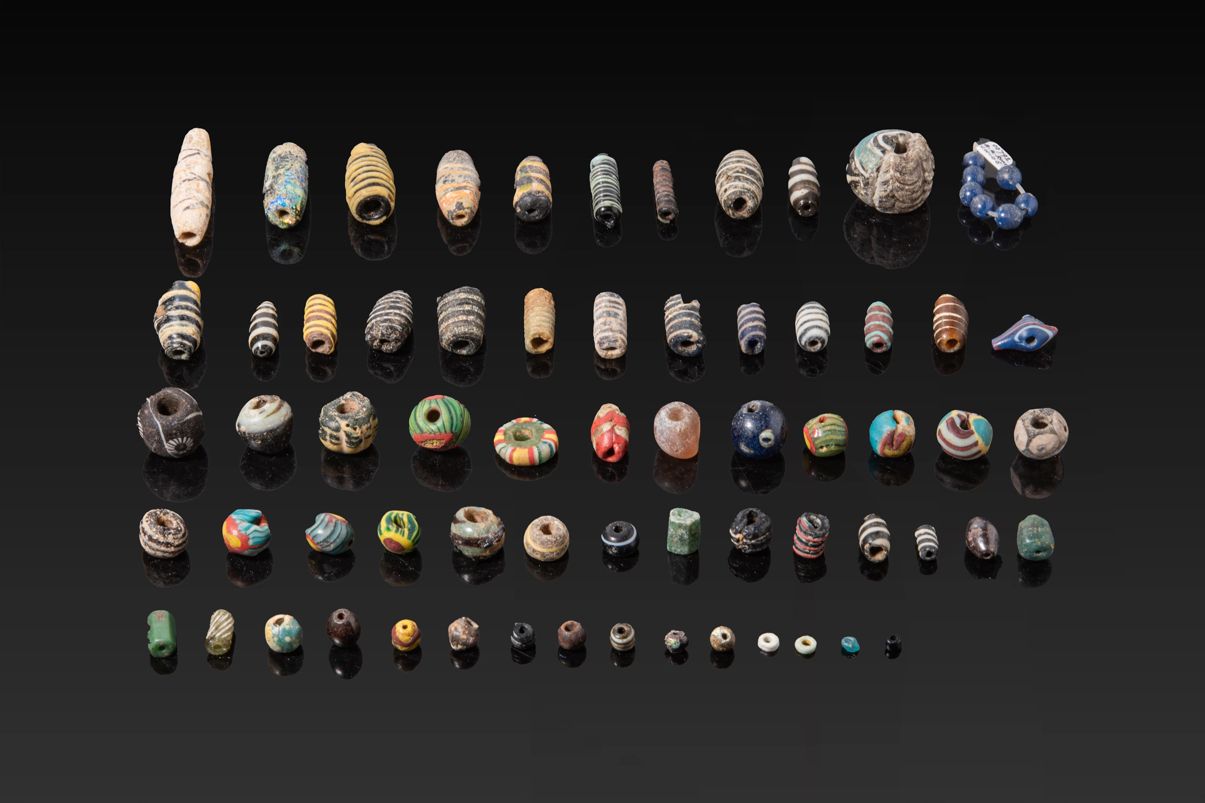 COLLECTION OF GREEK AND ROMAN GLASS BEADS