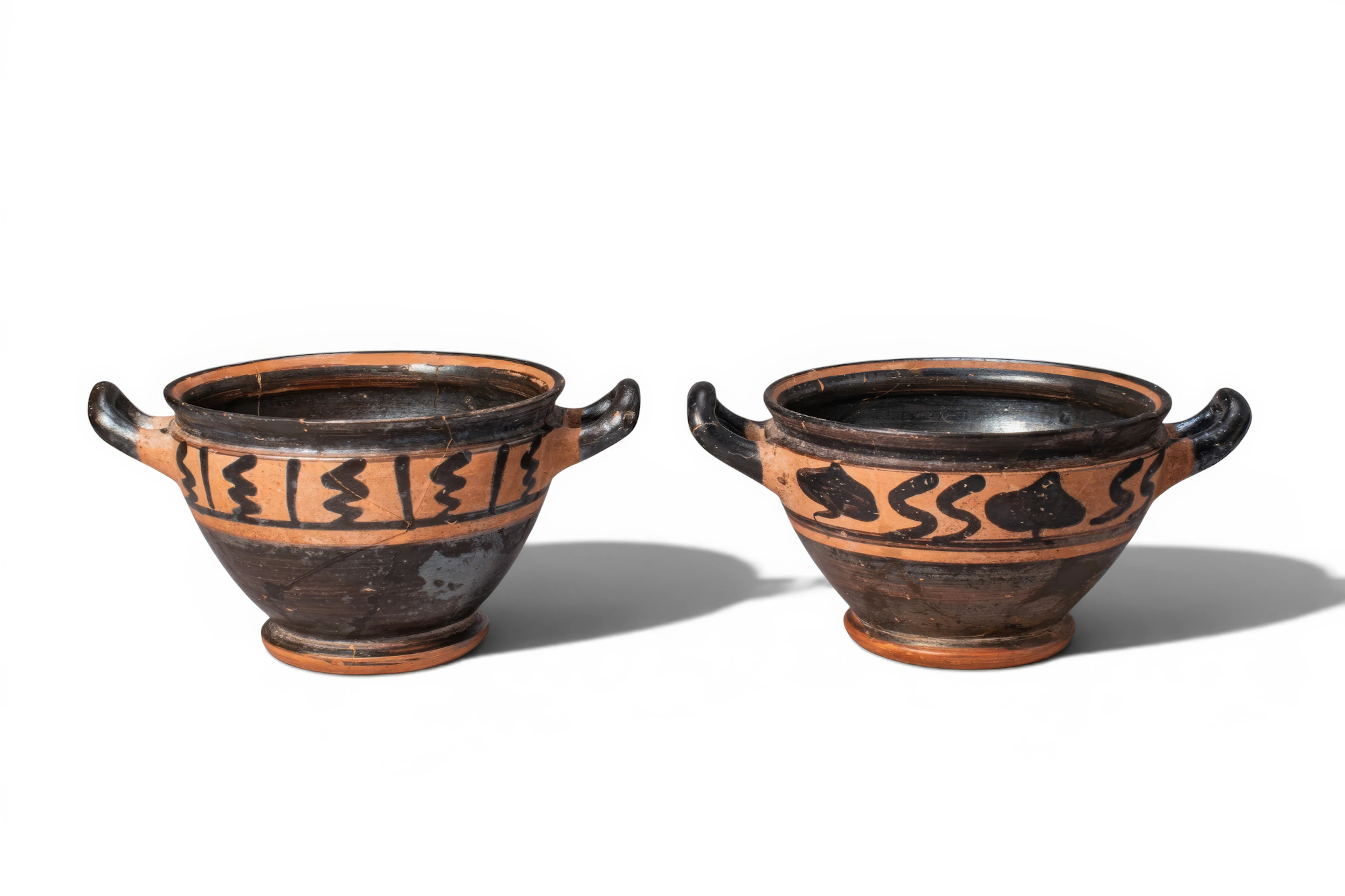 PAIR OF GREEK BLACK-FIGURE SKYPHOI