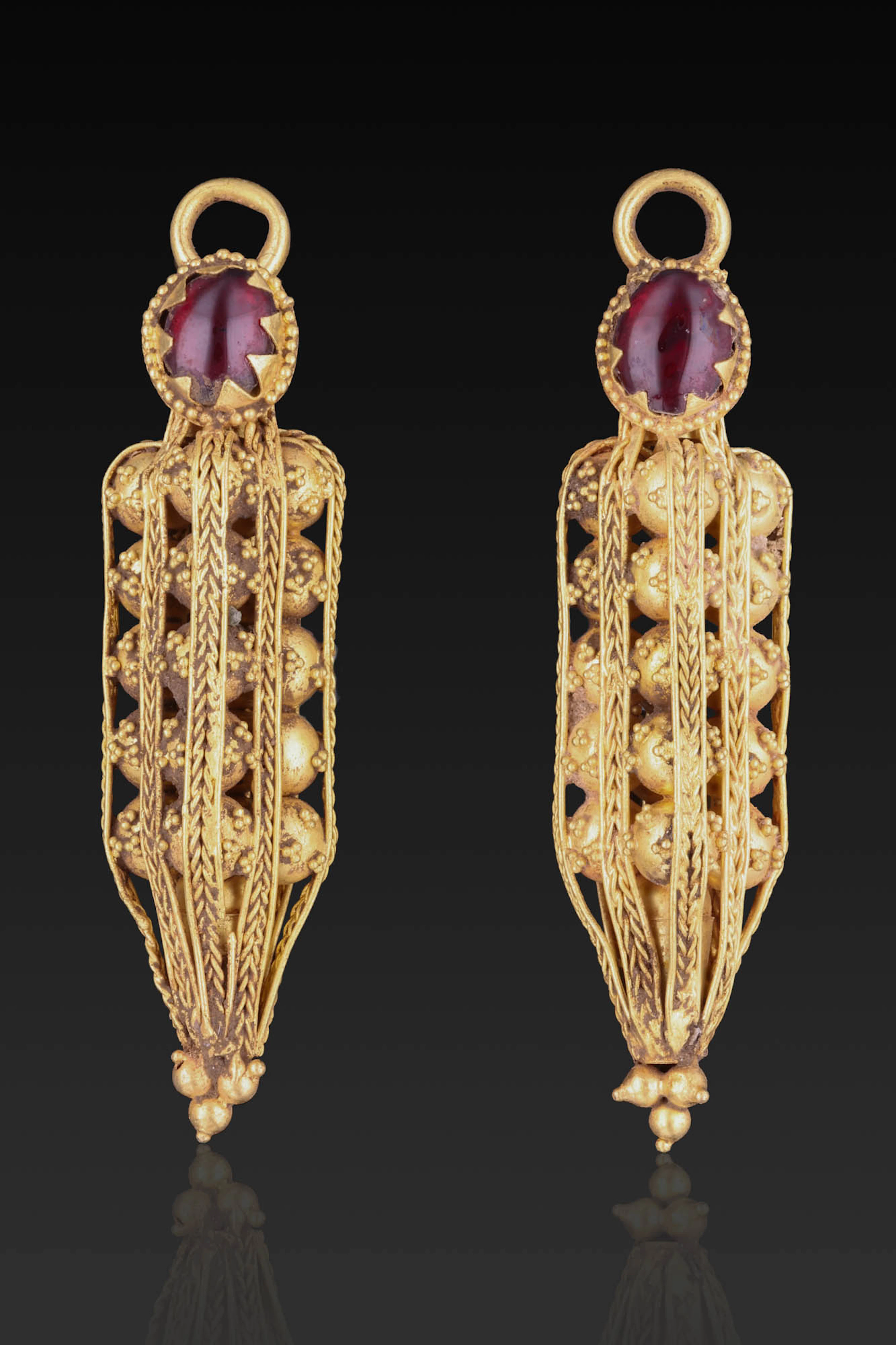 MATCHED PAIR OF ROMANO-PARTHIAN GOLD EARRINGS WITH RED GARNET CABOCHONS
