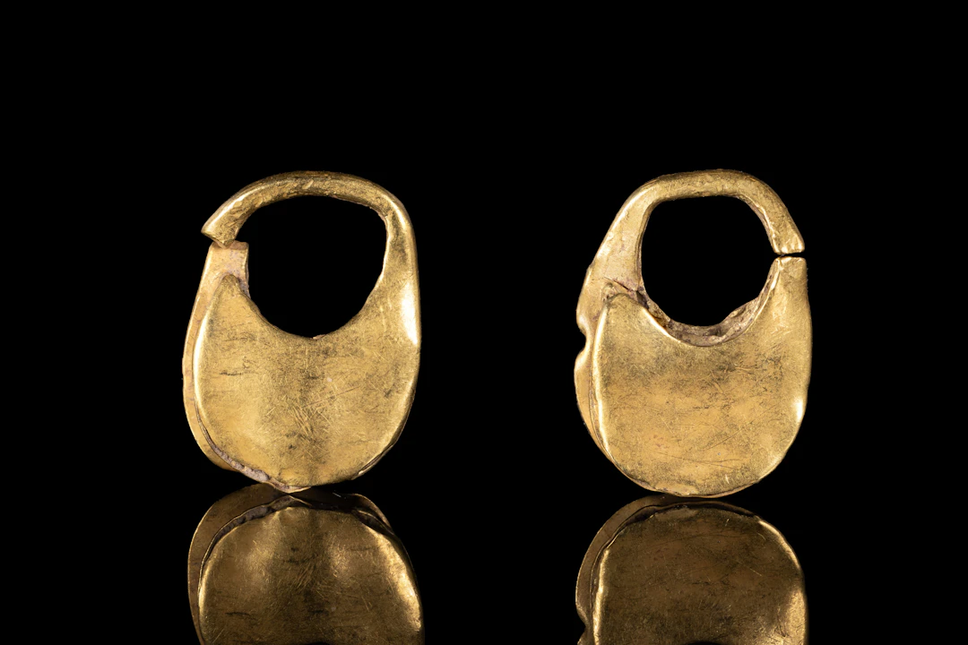 MATCHED PAIR OF PHOENICIAN GOLD EARRINGS