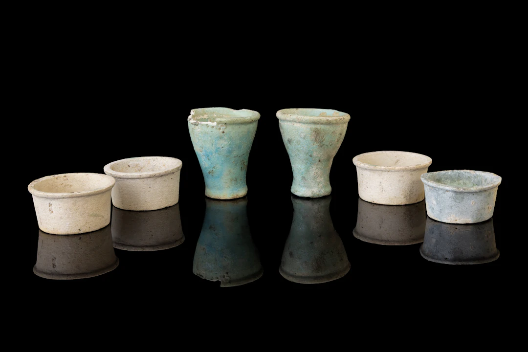 COLLECTION OF EGYPTIAN FAIENCE OFFERING CUPS