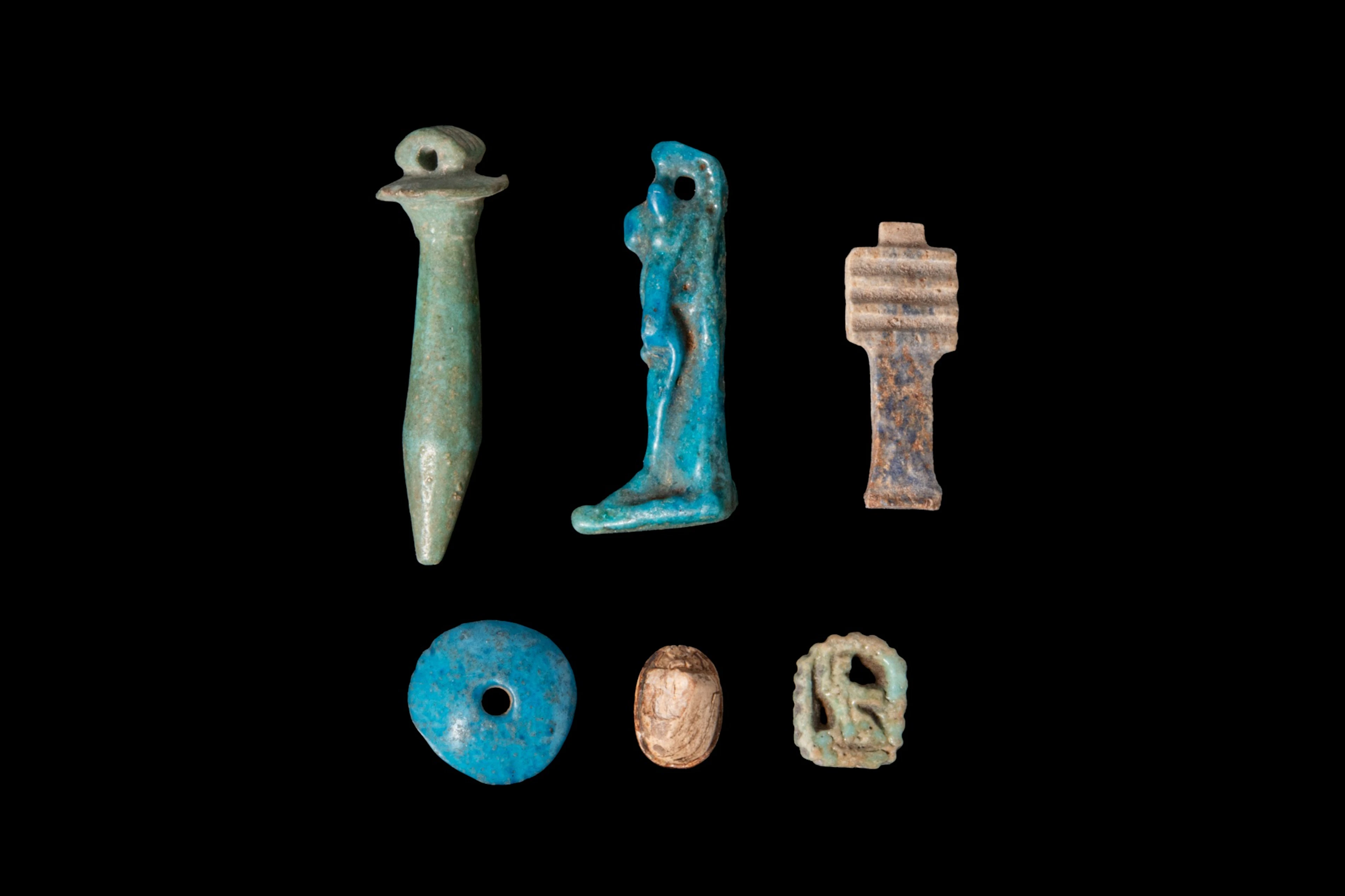 COLLECTION OF EGYPTIAN FAIENCE AND STONE AMULETS