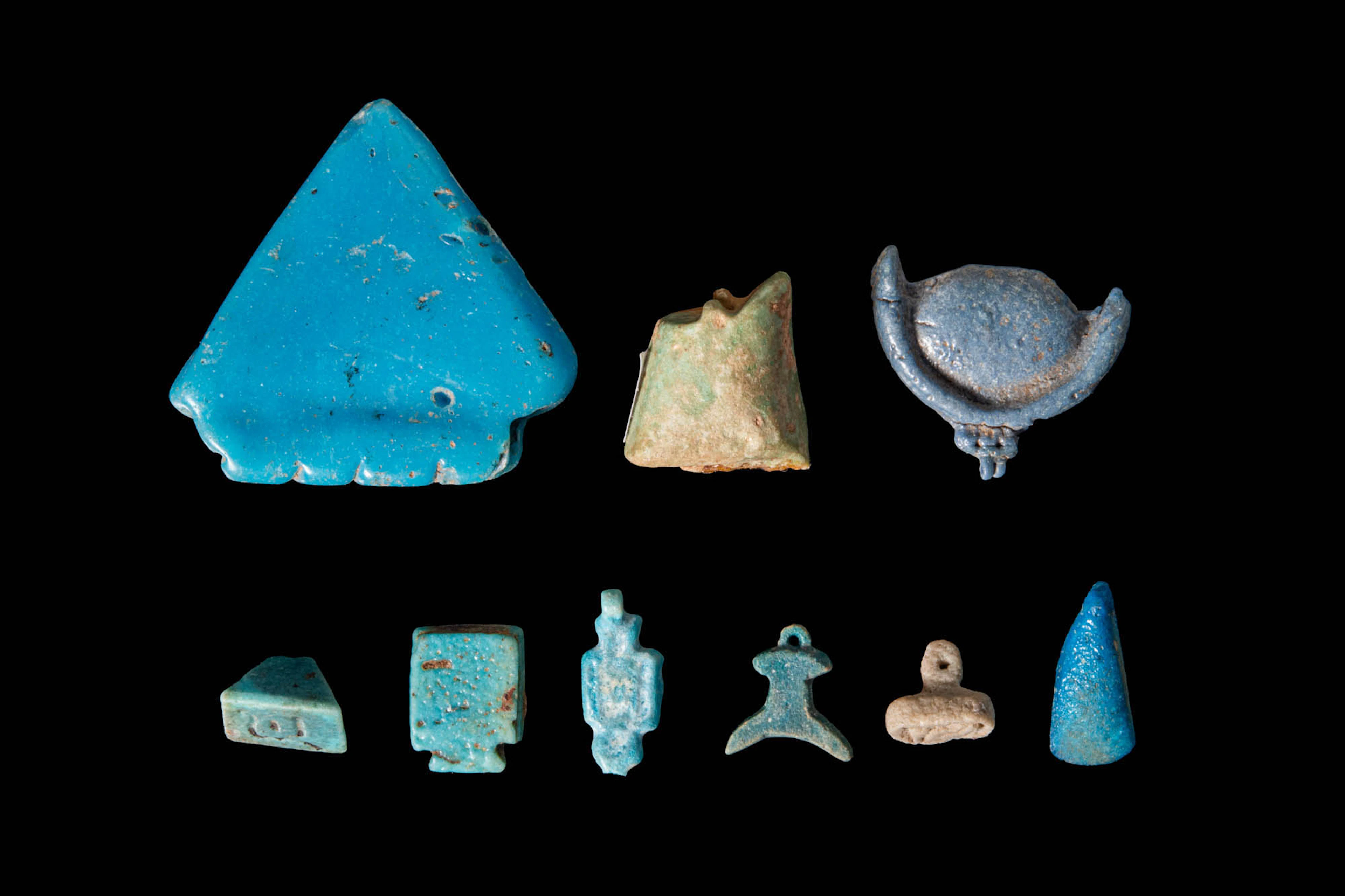 COLLECTION OF EGYPTIAN FAIENCE BEADS, AMULETS AND PENDANTS