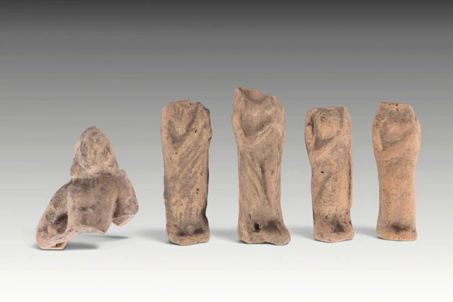 COLLECTION OF HELLENISTIC TERRACOTTA FIGURINES FROM A TEMPLE