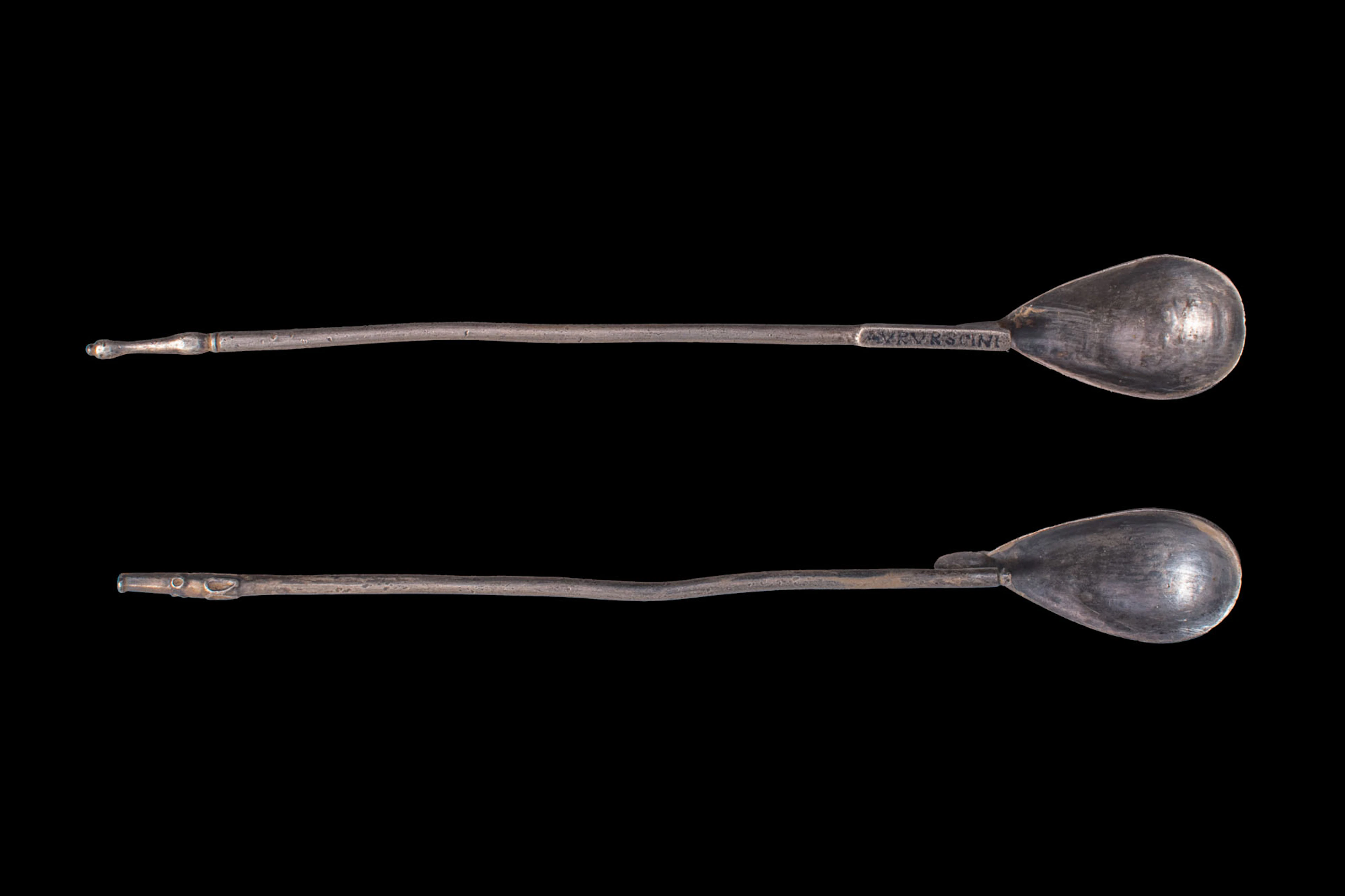 PAIR OF BYZANTINE SILVER AND NIELLO RITUAL SPOONS WITH INSCRIPTION 'AURURSCINI'