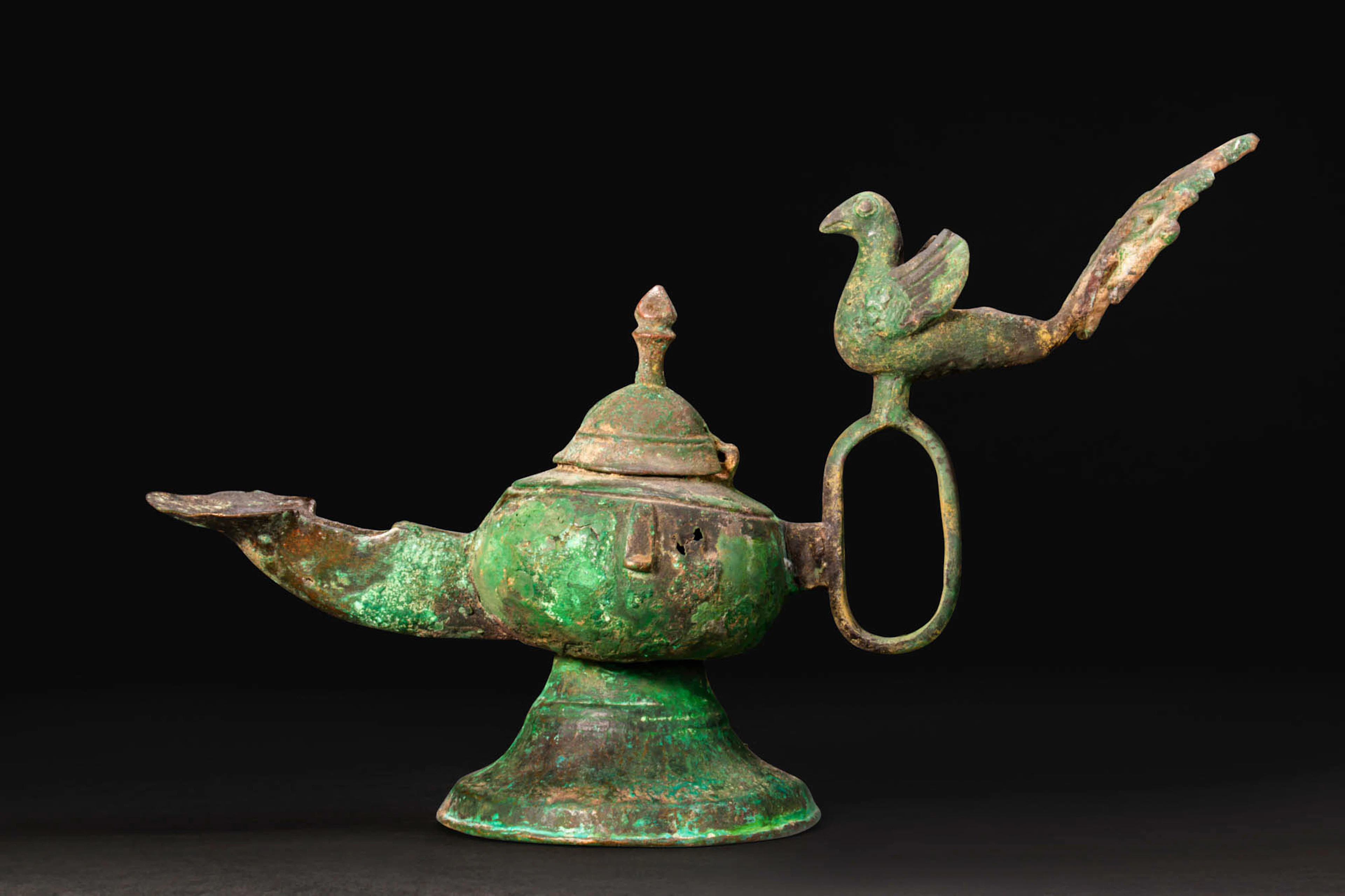 SELJUK BRONZE OIL LAMP WITH BIRD FINIAL