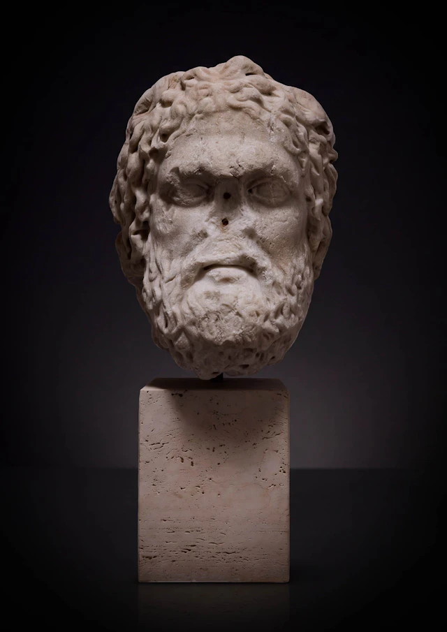 OVER LIFE-SIZE ROMAN MARBLE HEAD OF JUPITER OR POSEIDON