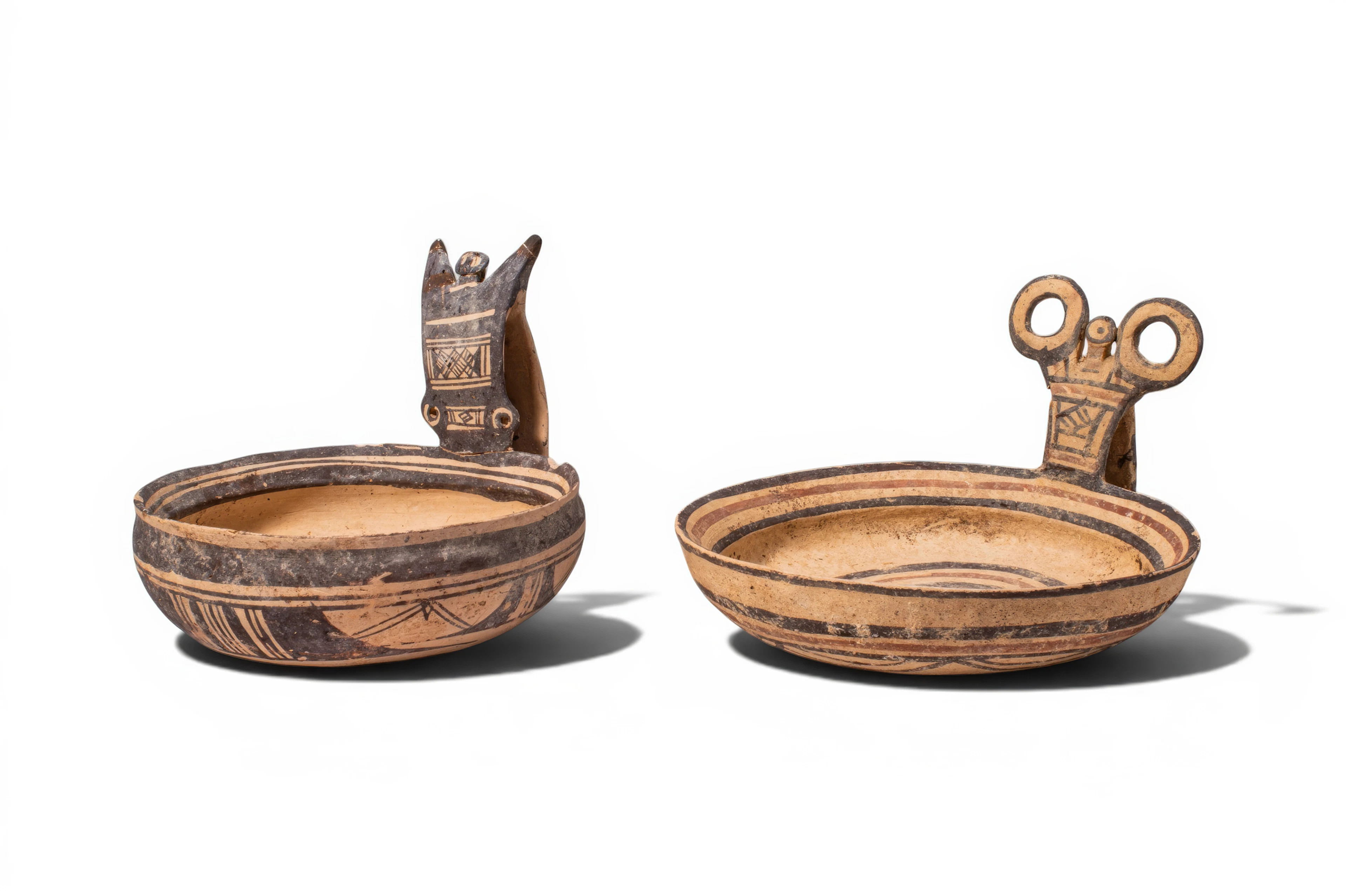 PAIR OF DAUNIAN TERRACOTTA KYATHOI