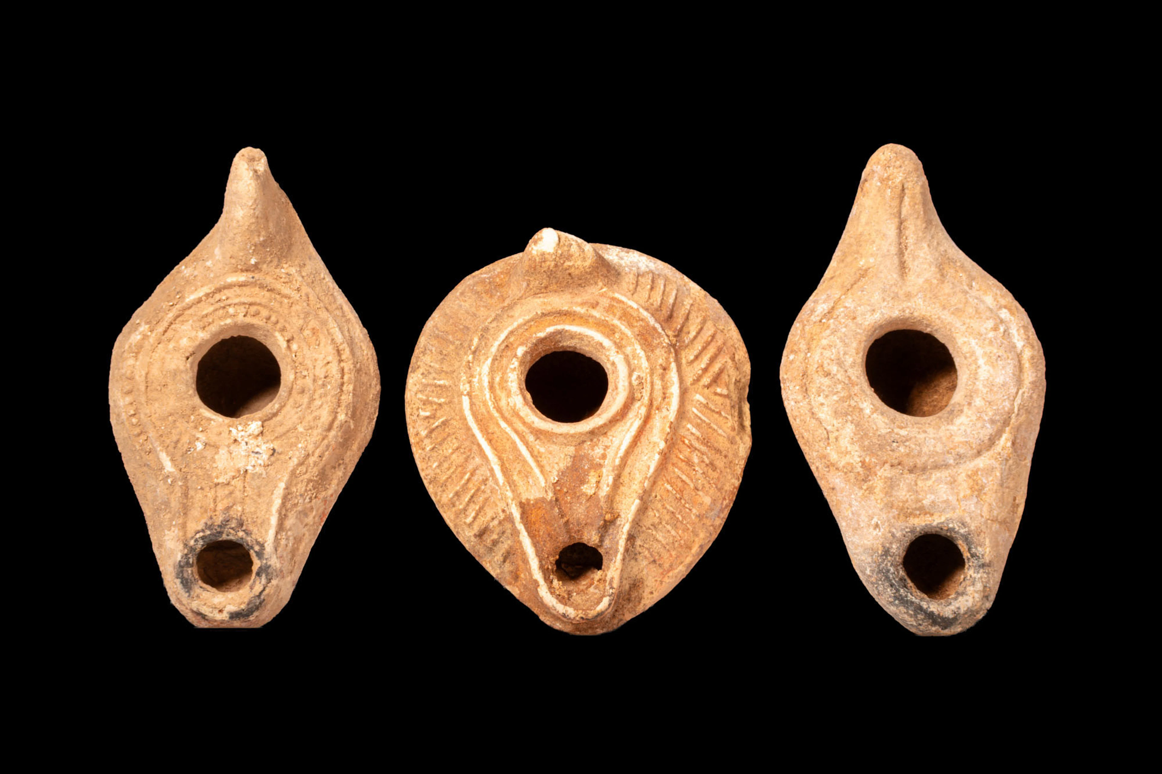 COLLECTION OF BYZANTINE TERRACOTTA OIL LAMPS WITH MOULDED DECORATION