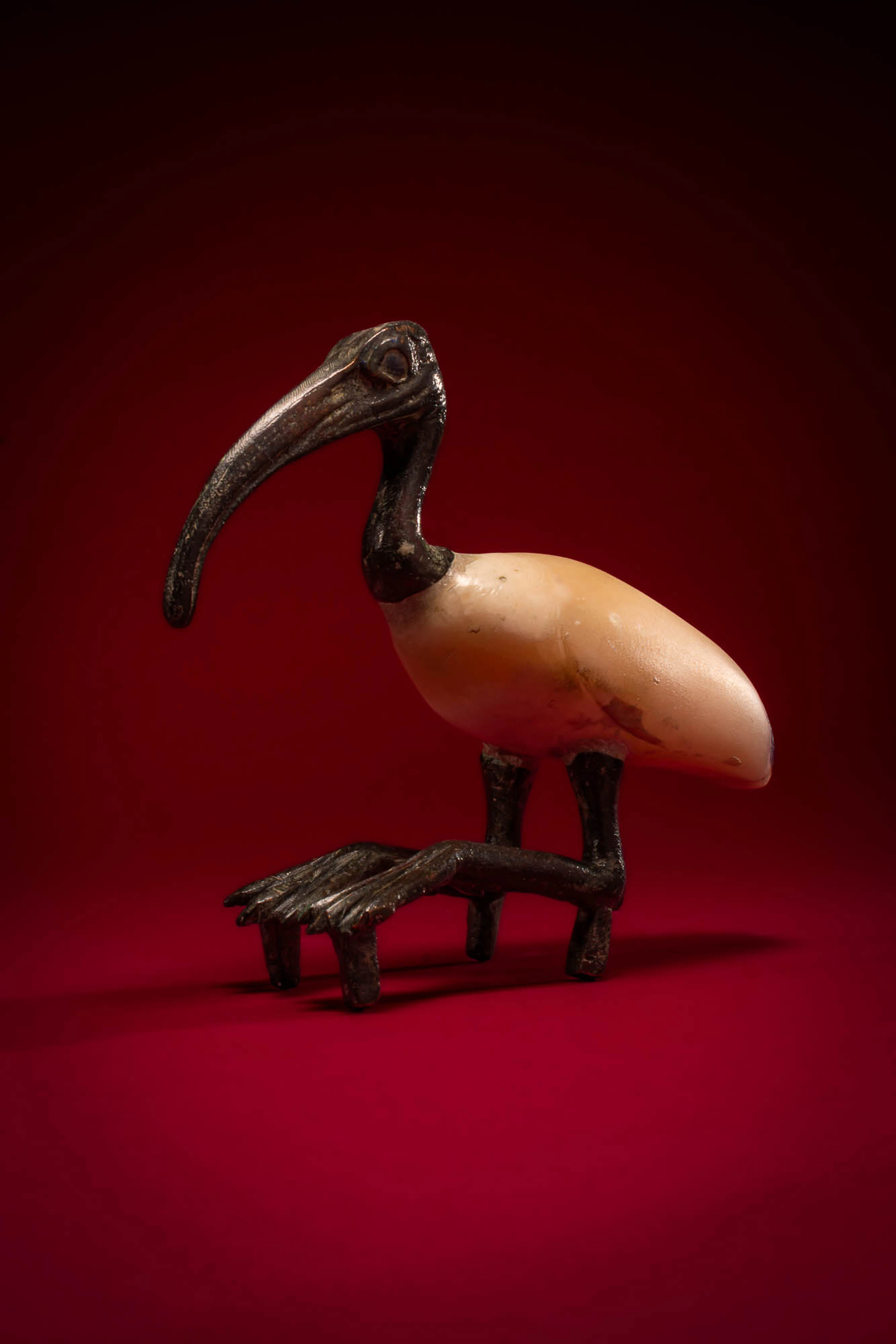STUNNING EGYPTIAN BRONZE AND STONE FIGURINE OF IBIS