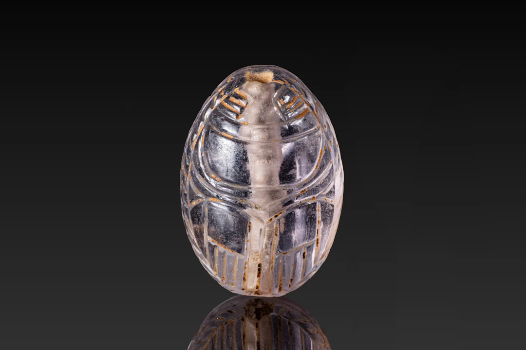 EGYPTIAN ROCK CRYSTAL SCARAB WITH DEITIES