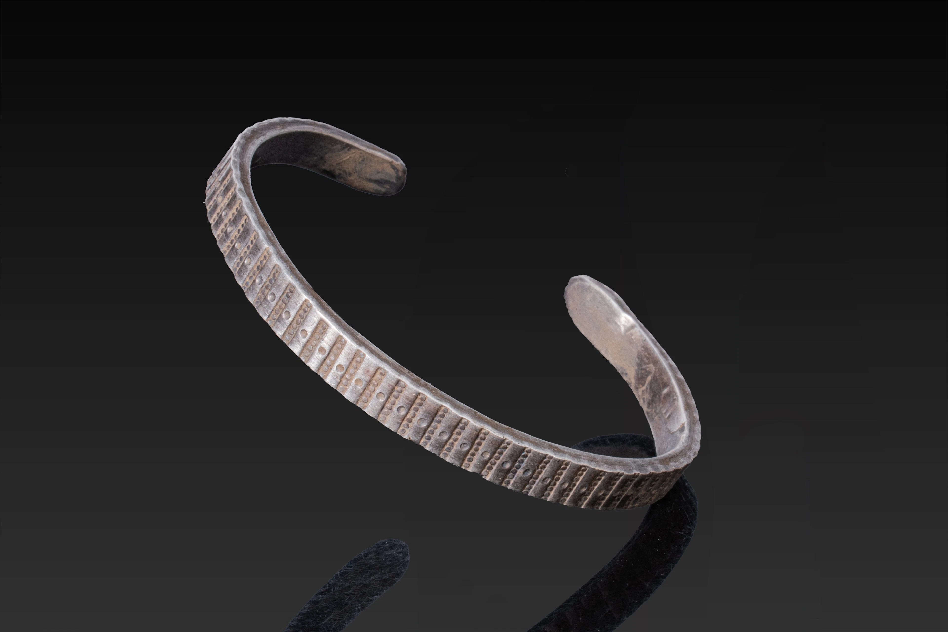 VIKING SOLID SILVER BRACELET WITH STAMPED MOTIFS