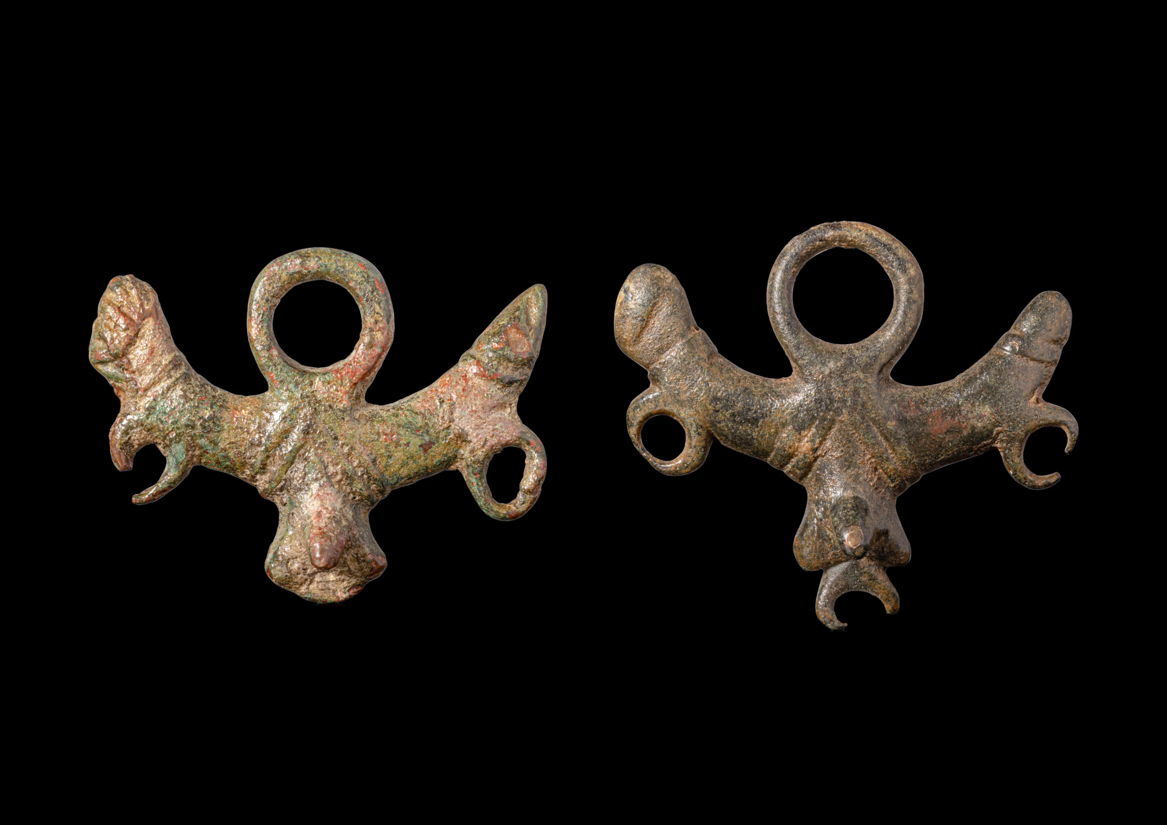 PAIR OF ROMAN BRONZE FERTILITY PENDANTS