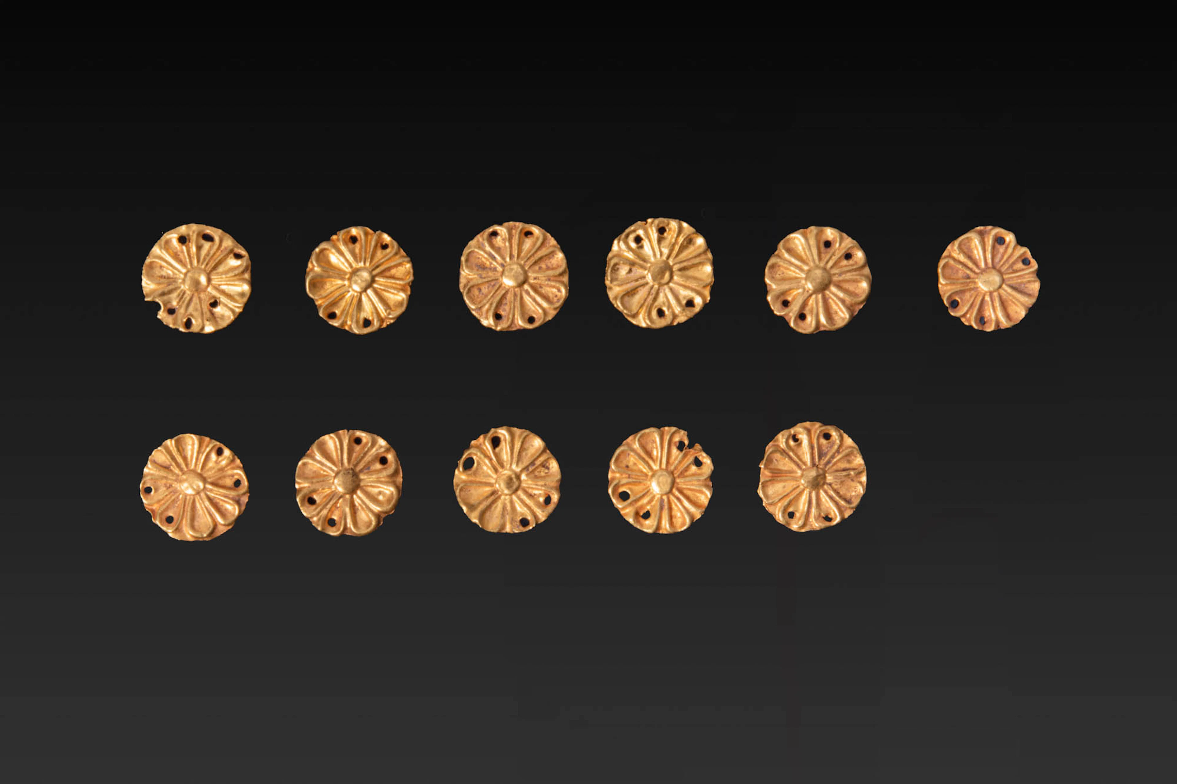 COLLECTION OF GREEK GOLD ROSETTE APPLIQUES