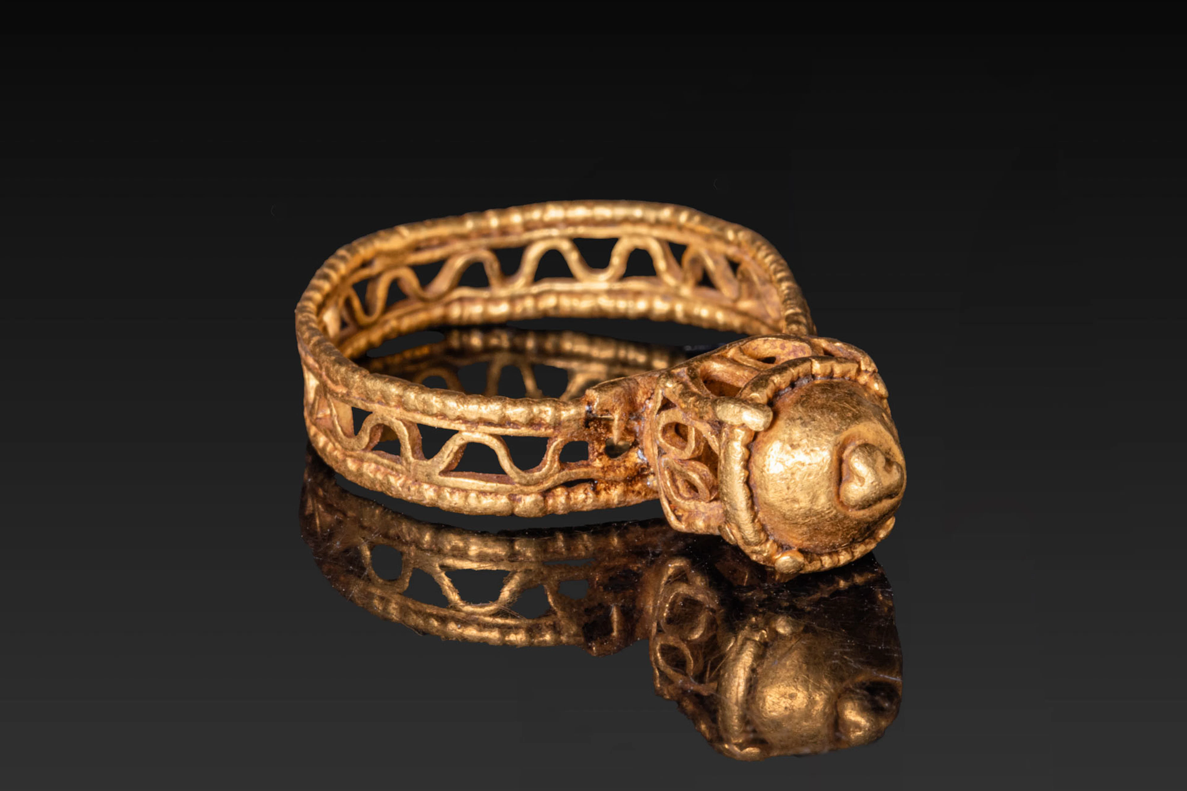 BYZANTINE OPENWORK GOLD ARCHITECTURAL RING WITH DOMED BEZEL