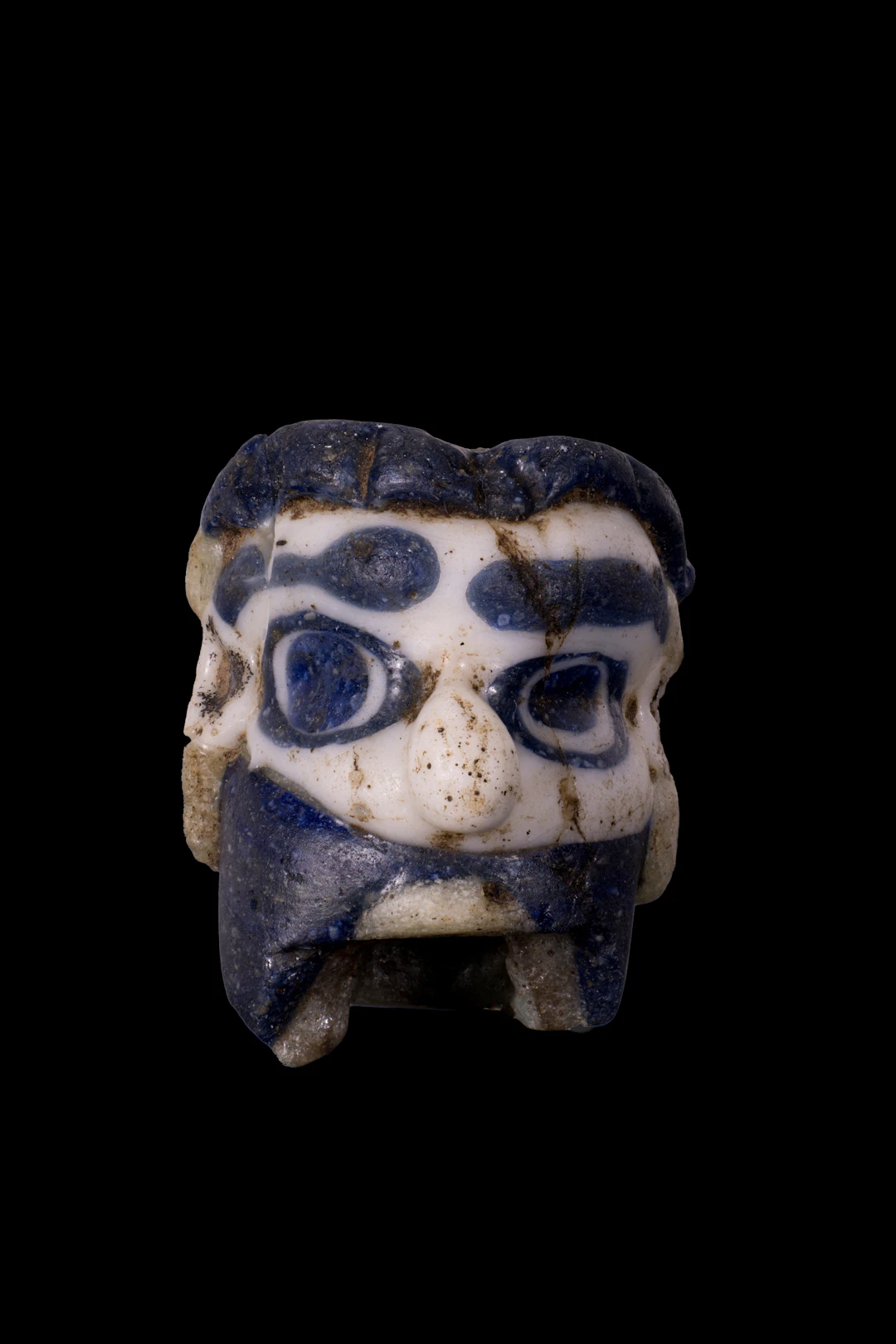 GRAECO-PHOENICIAN POLYCHROME GLASS FACE BEAD
