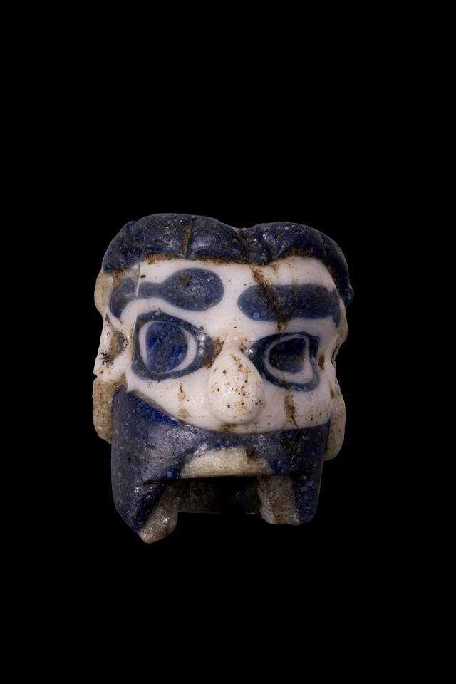 GRAECO-PHOENICIAN POLYCHROME GLASS FACE BEAD