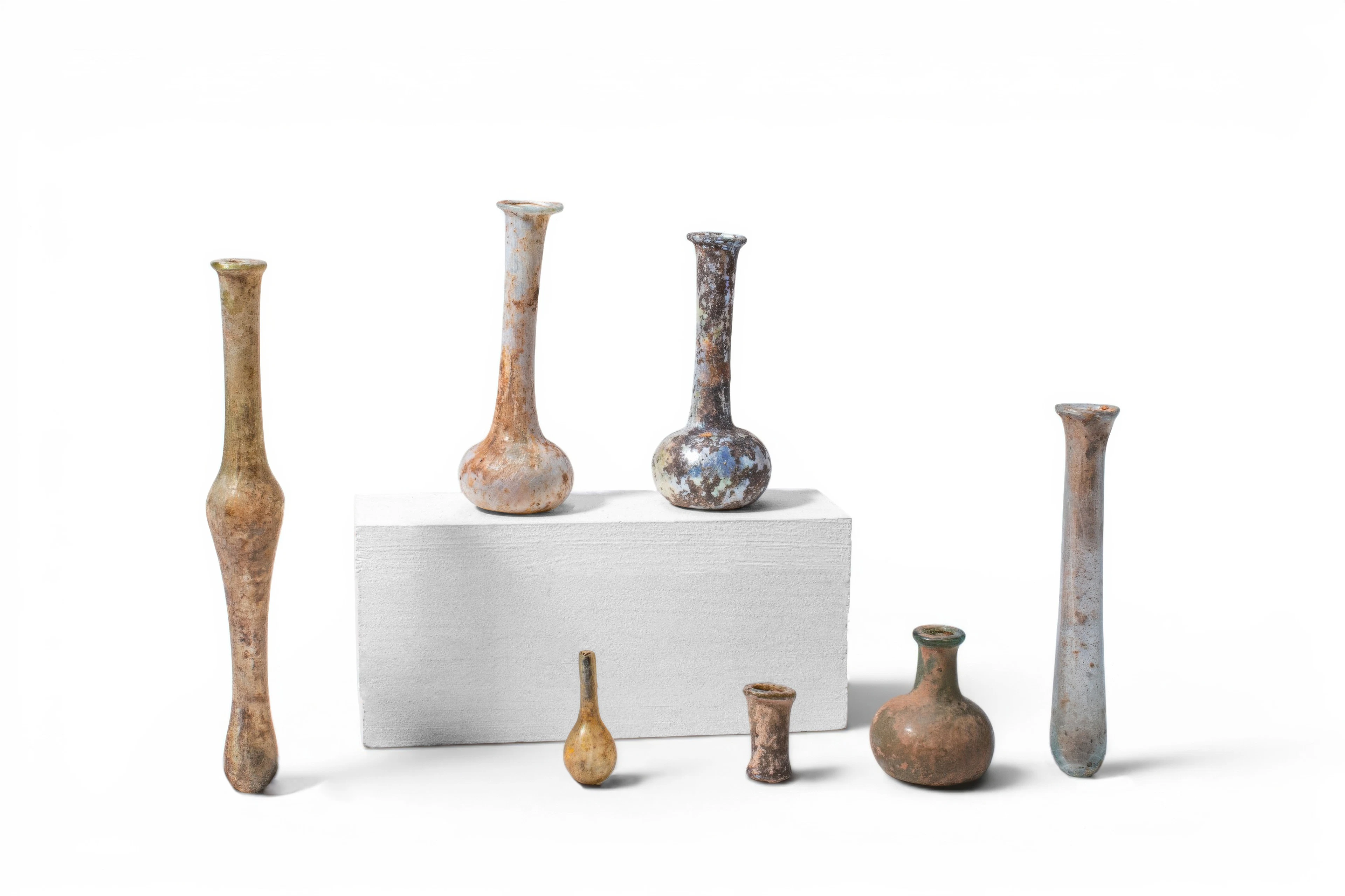 COLLECTION OF HELLENISTIC AND ROMAN GLASS UNGUENTARIA
