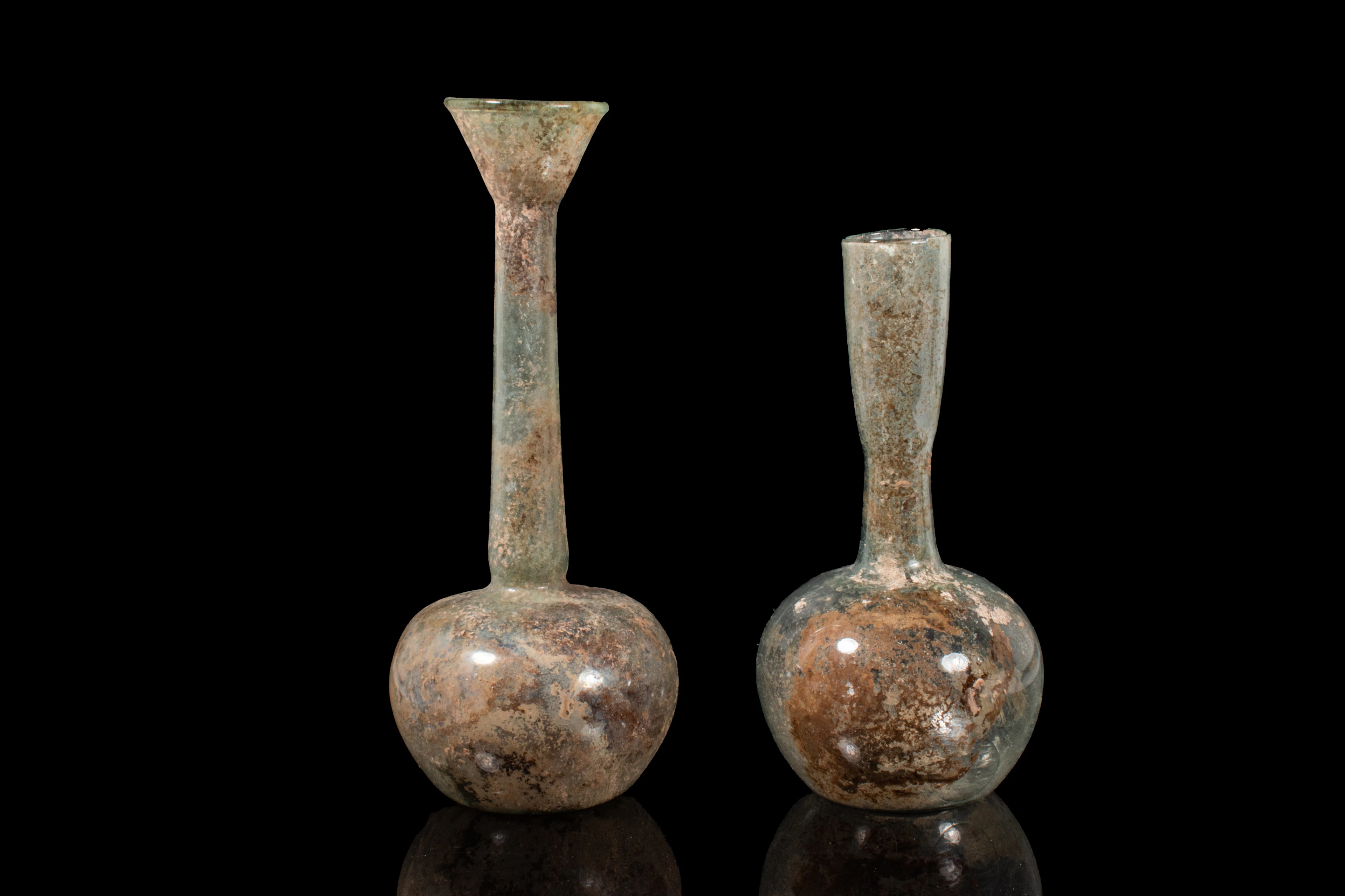 PAIR OF LARGE ROMAN GLASS APPLE-SHAPED UNGUENTARIA