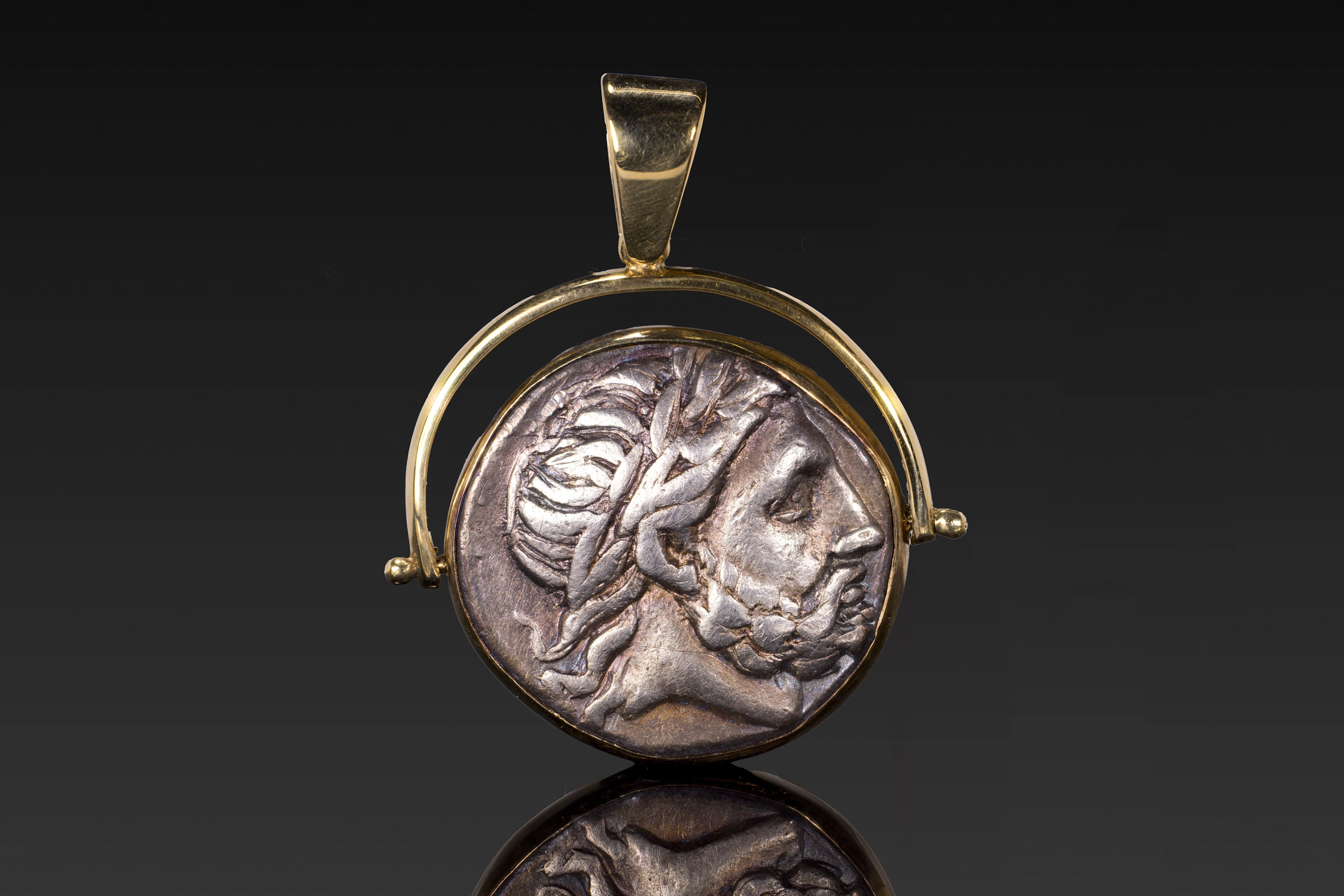 KINGDOM OF MACEDON SILVER TETRADRACHM OF PHILIP II IN GOLD PENDANT