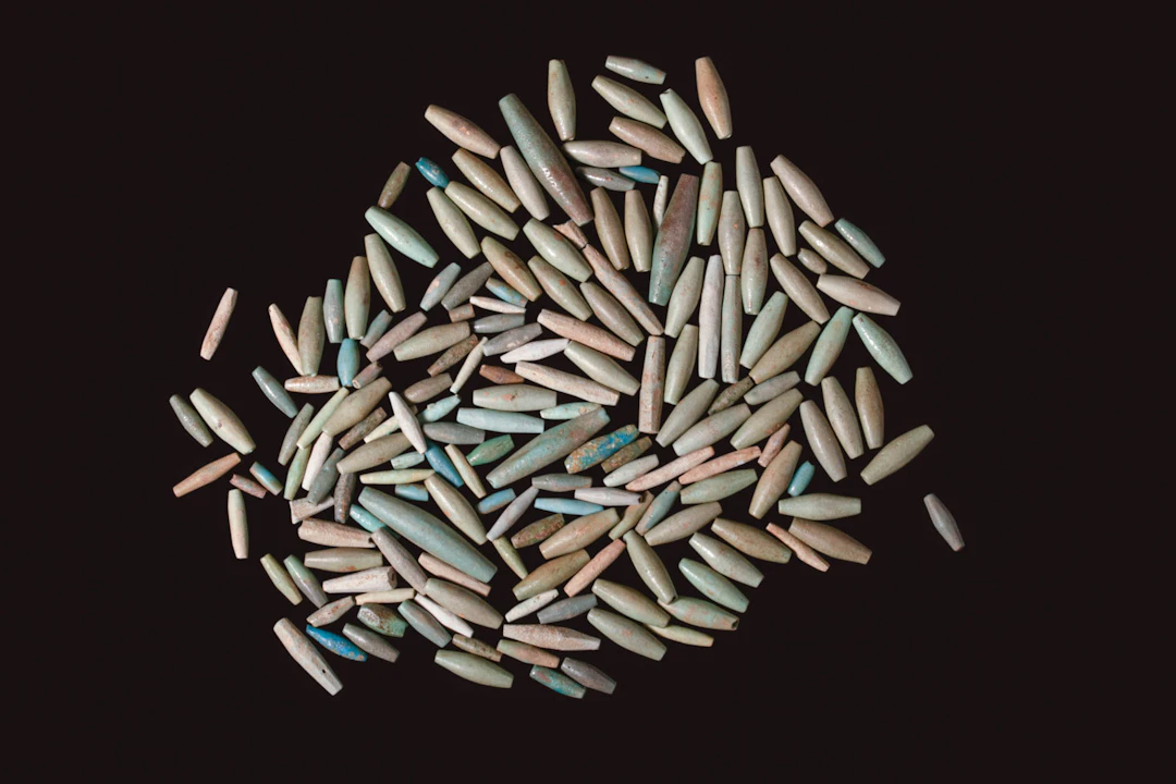 COLLECTION OF EGYPTIAN BICONICAL FAIENCE BEADS