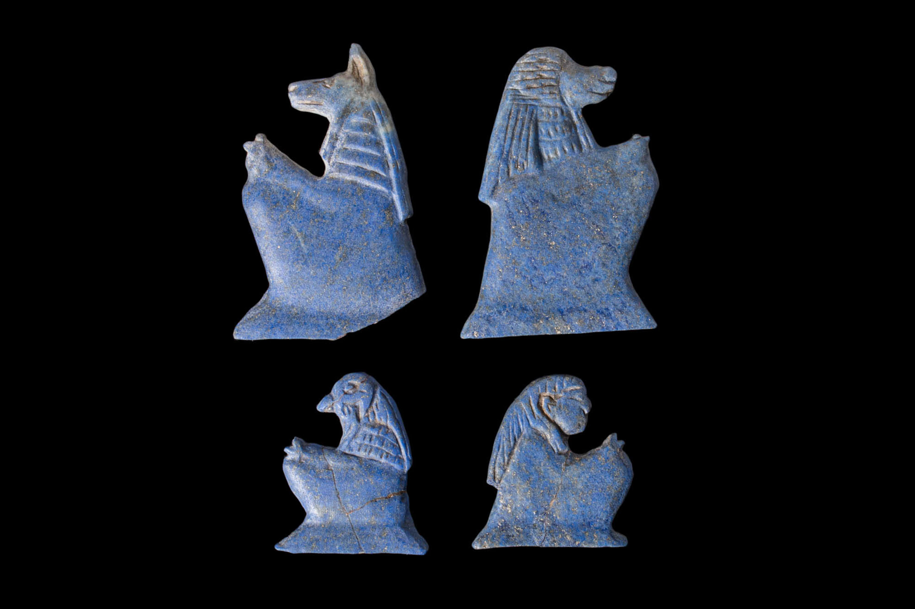 COLLECTION OF EGYPTIAN LAPIS LAZULI INLAYS DEPICTING THE FOUR SONS OF HORUS
